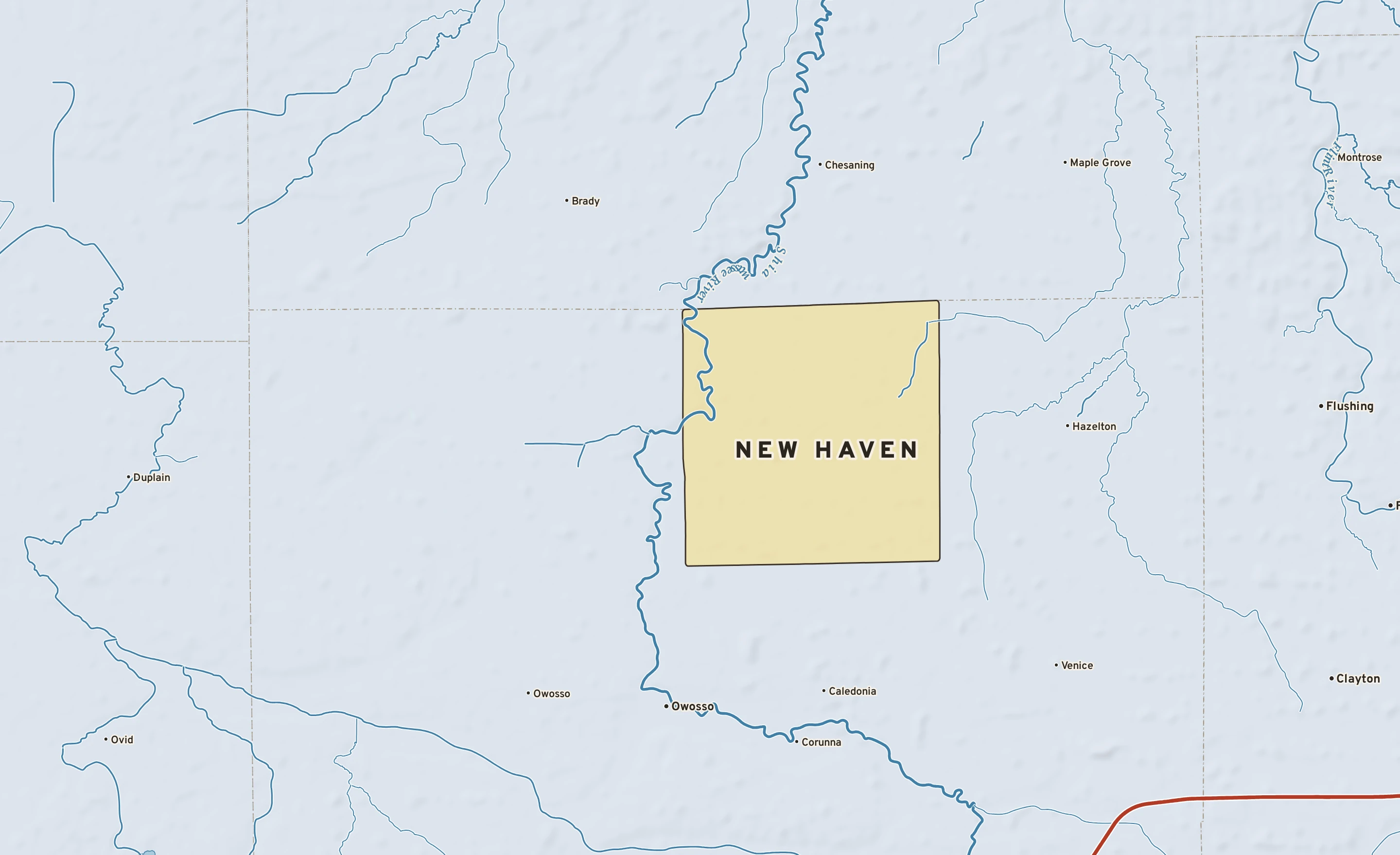 Shaded-relief atlas plate of New Haven, Michigan: rivers, roads, the city limits and where the water drains.