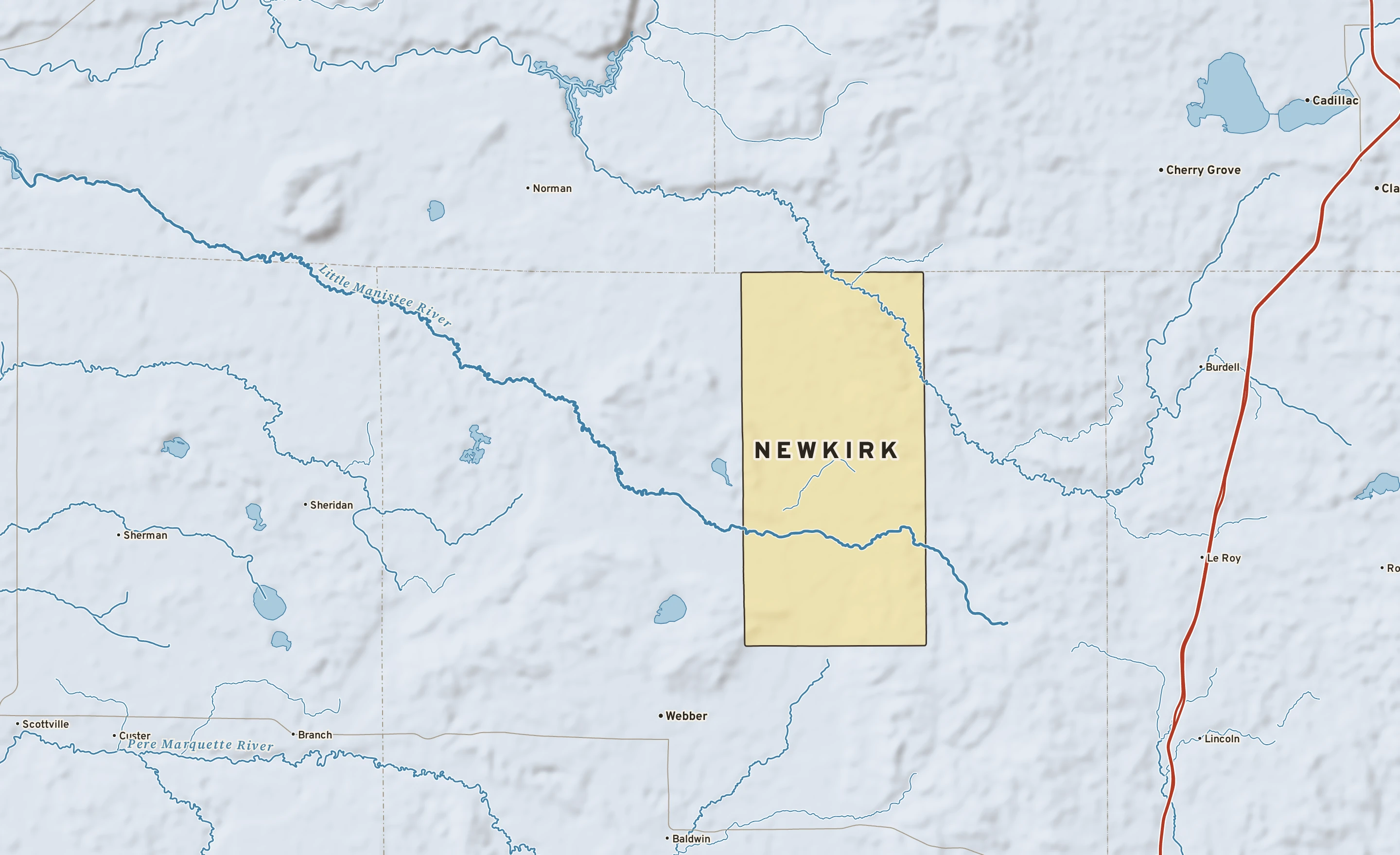 Shaded-relief atlas plate of Newkirk, Michigan: rivers, roads, the city limits and where the water drains.