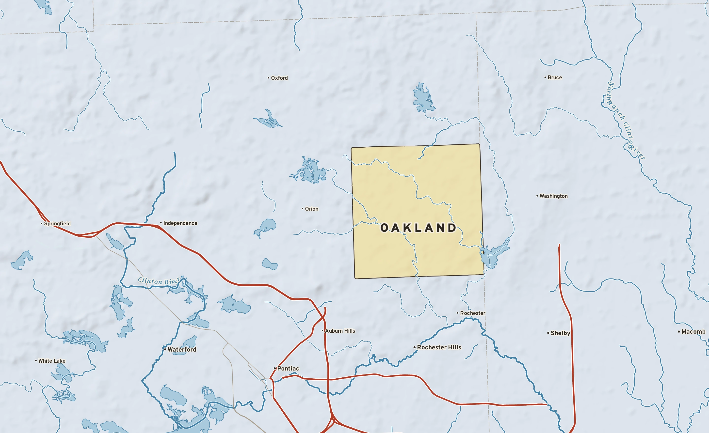 Shaded-relief atlas plate of Oakland, Michigan: rivers, roads, the city limits and where the water drains.