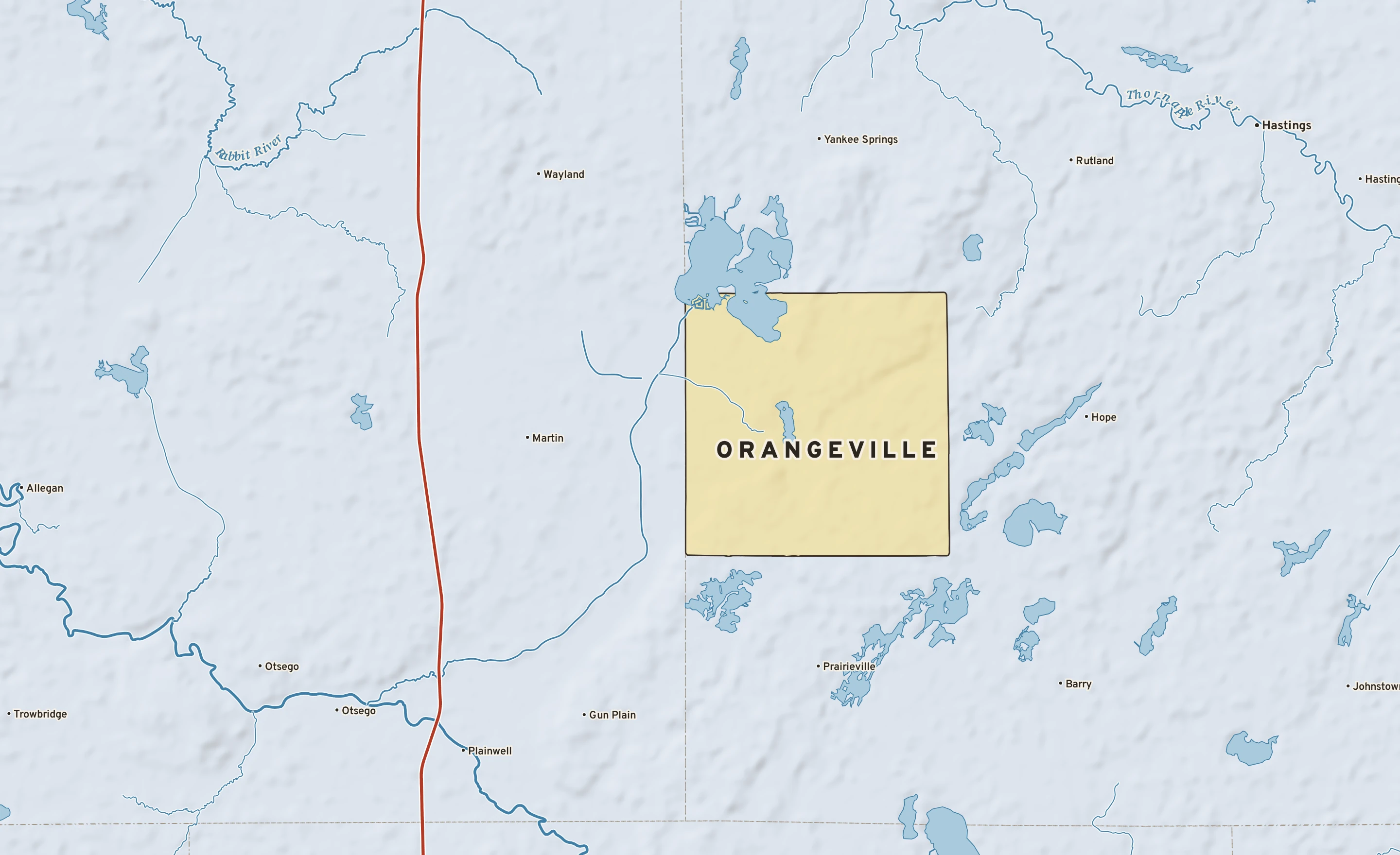Shaded-relief atlas plate of Orangeville, Michigan: rivers, roads, the city limits and where the water drains.