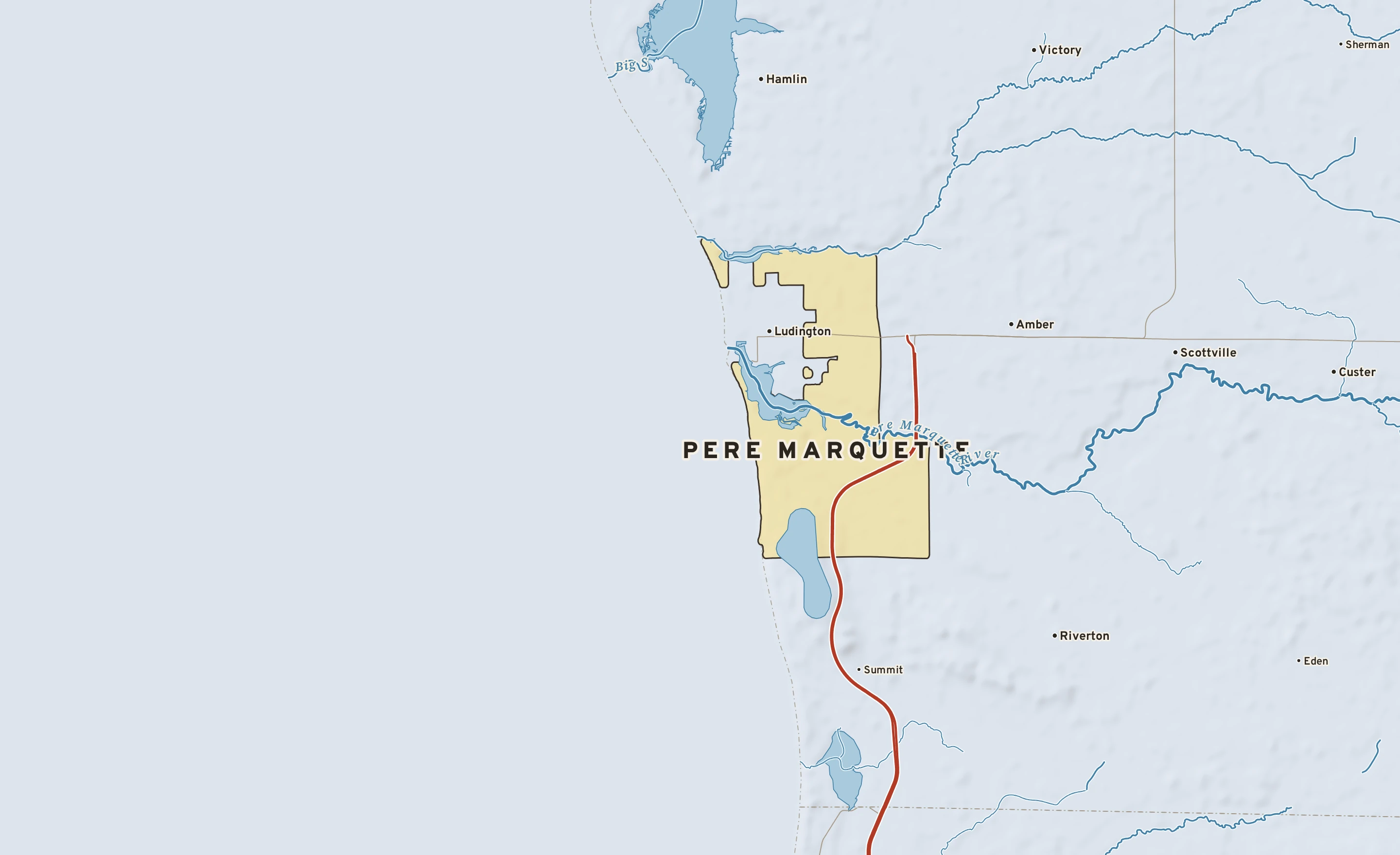 Shaded-relief atlas plate of Pere Marquette, Michigan: rivers, roads, the city limits and where the water drains.