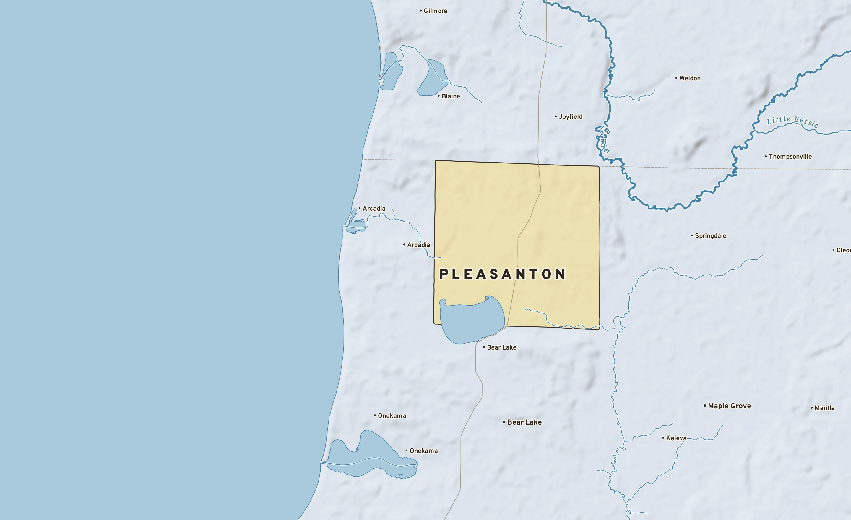 Shaded-relief atlas plate of Pleasanton, Michigan: rivers, roads, the city limits and where the water drains.