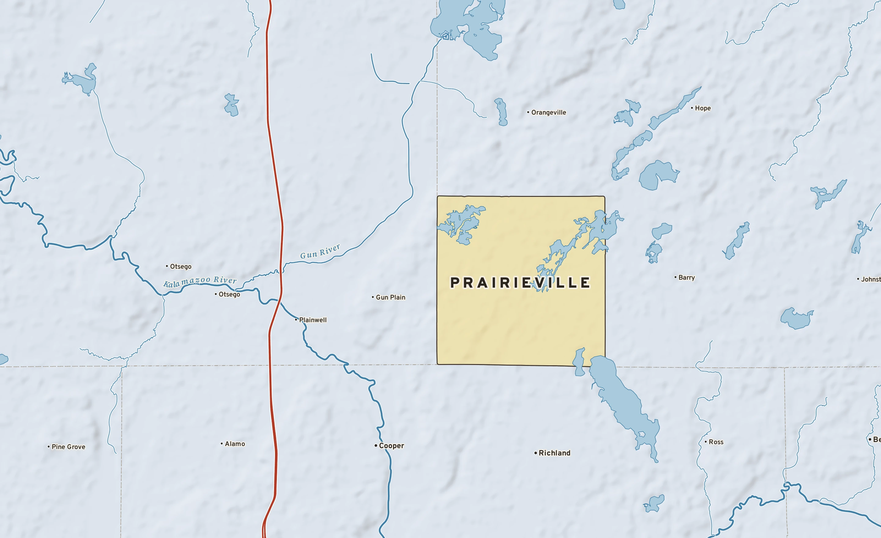 Shaded-relief atlas plate of Prairieville, Michigan: rivers, roads, the city limits and where the water drains.