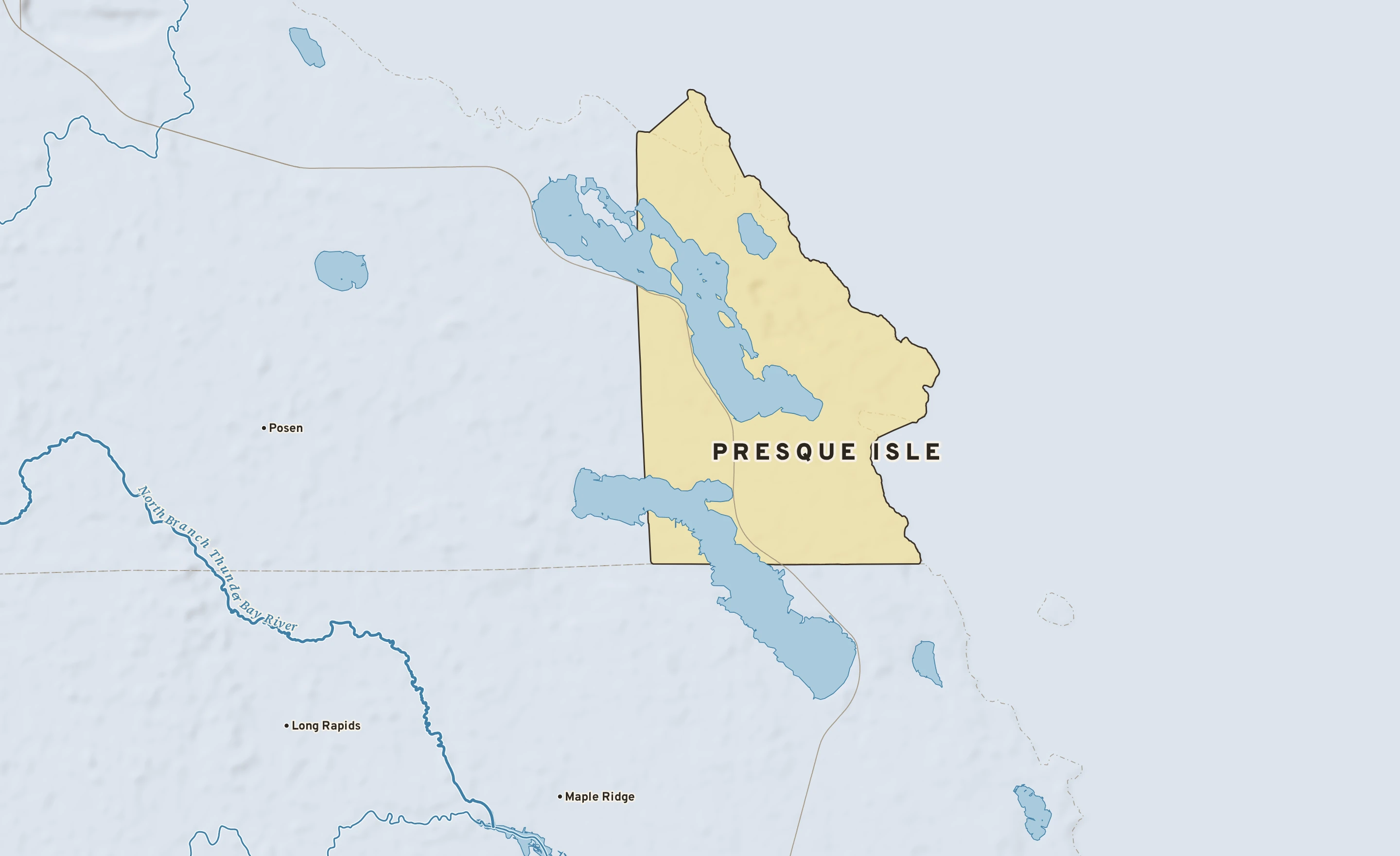 Shaded-relief atlas plate of Presque Isle, Michigan: rivers, roads, the city limits and where the water drains.