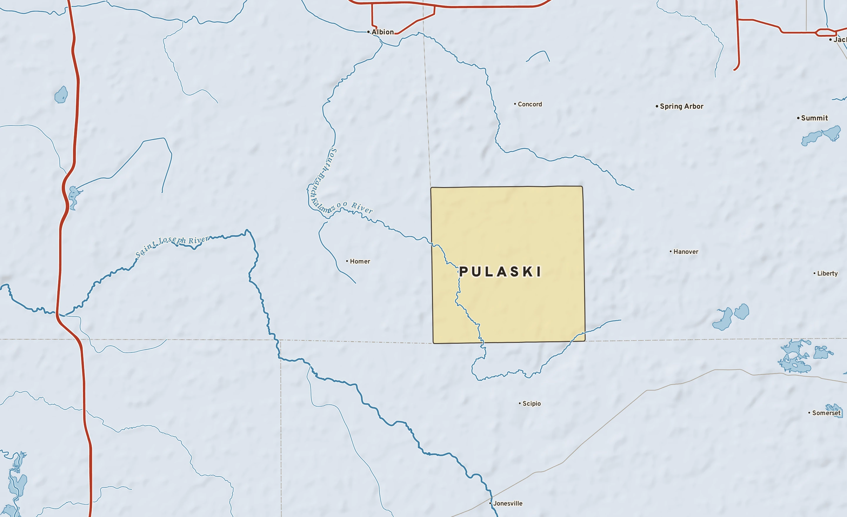 Shaded-relief atlas plate of Pulaski, Michigan: rivers, roads, the city limits and where the water drains.