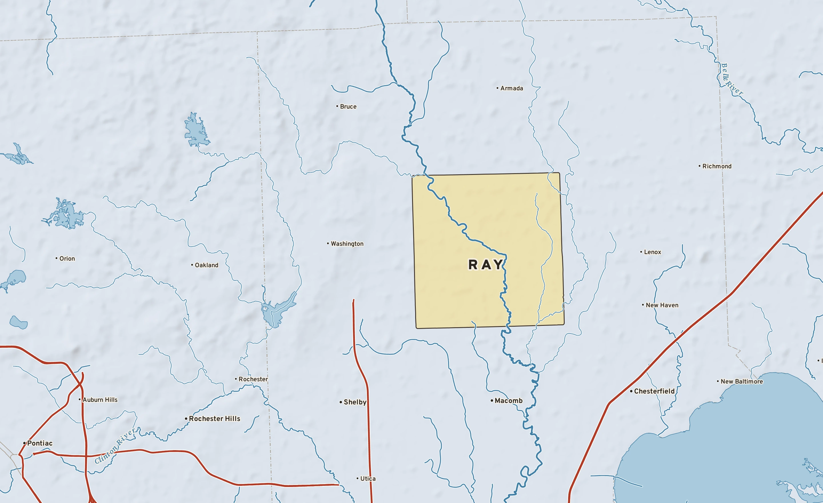 Shaded-relief atlas plate of Ray, Michigan: rivers, roads, the city limits and where the water drains.