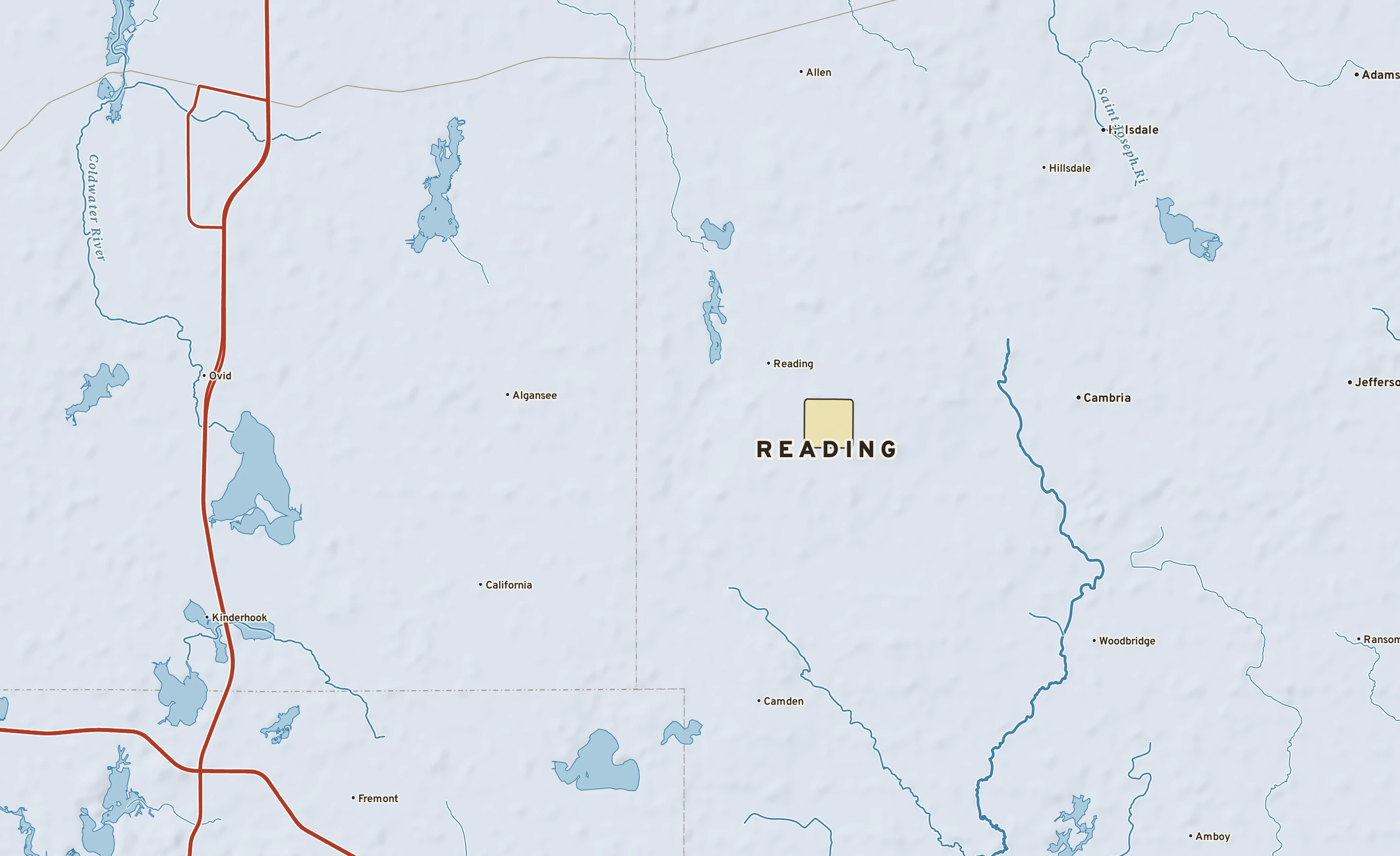 Shaded-relief atlas plate of Reading, Michigan: rivers, roads, the city limits and where the water drains.