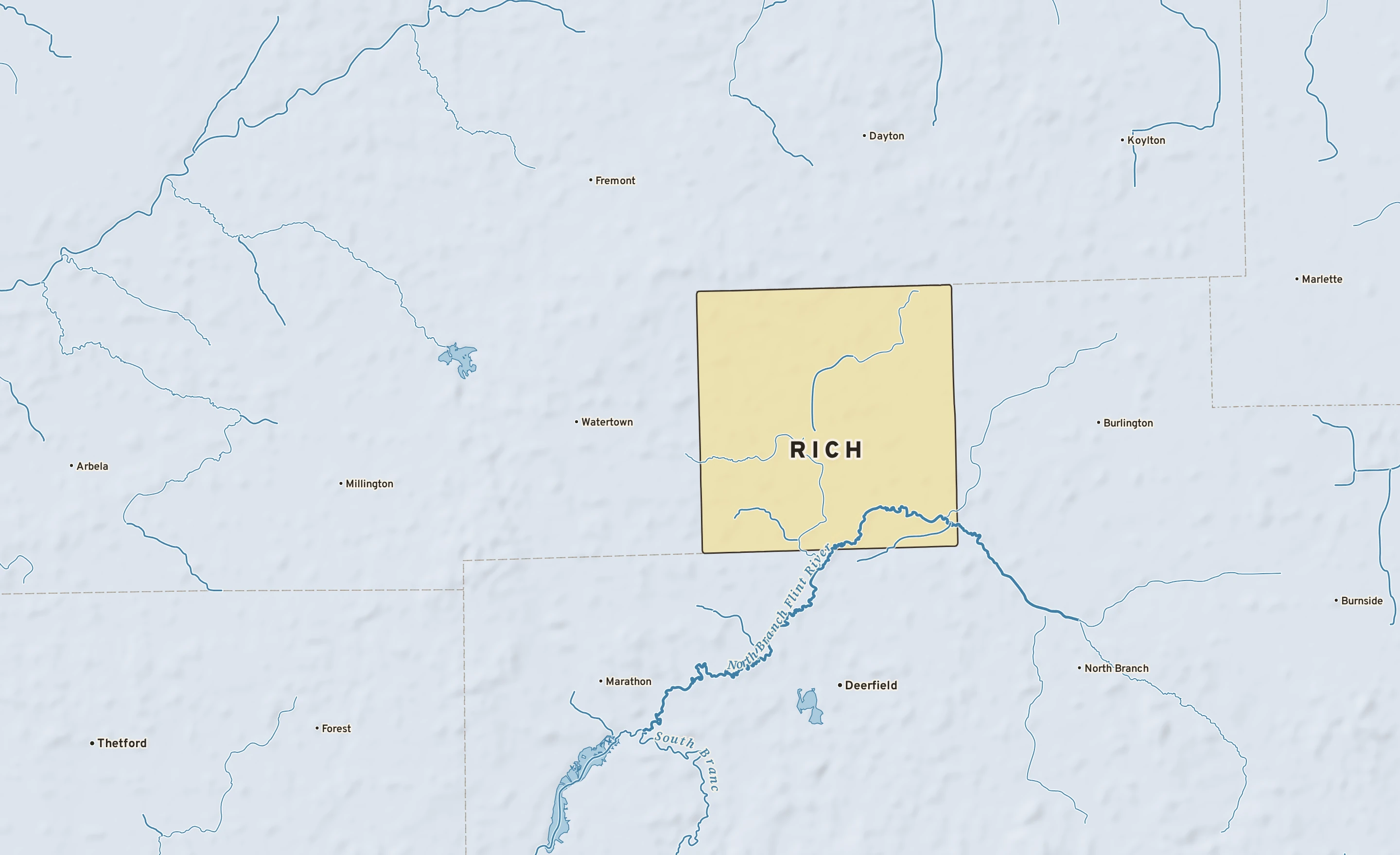 Shaded-relief atlas plate of Rich, Michigan: rivers, roads, the city limits and where the water drains.