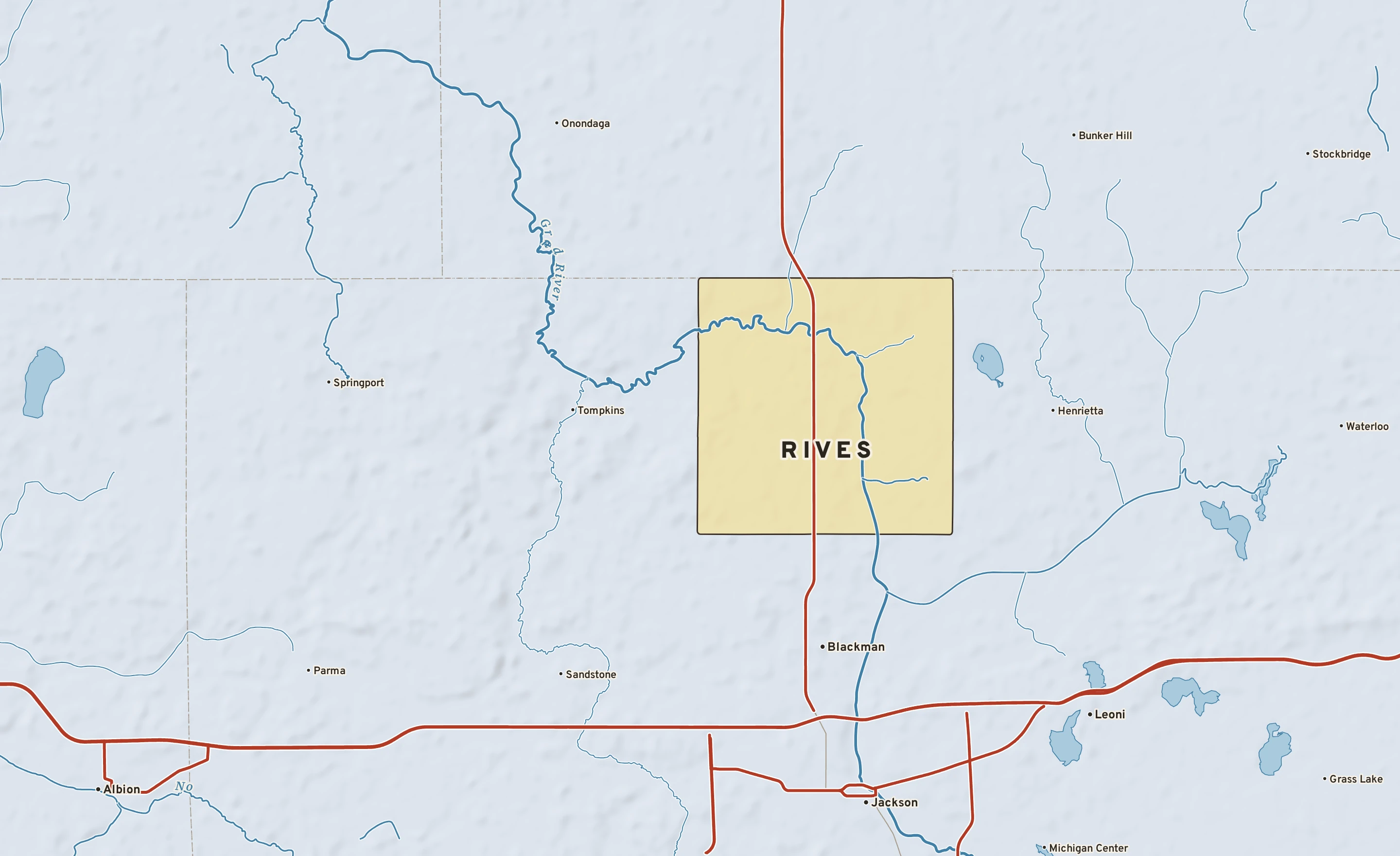 Shaded-relief atlas plate of Rives, Michigan: rivers, roads, the city limits and where the water drains.
