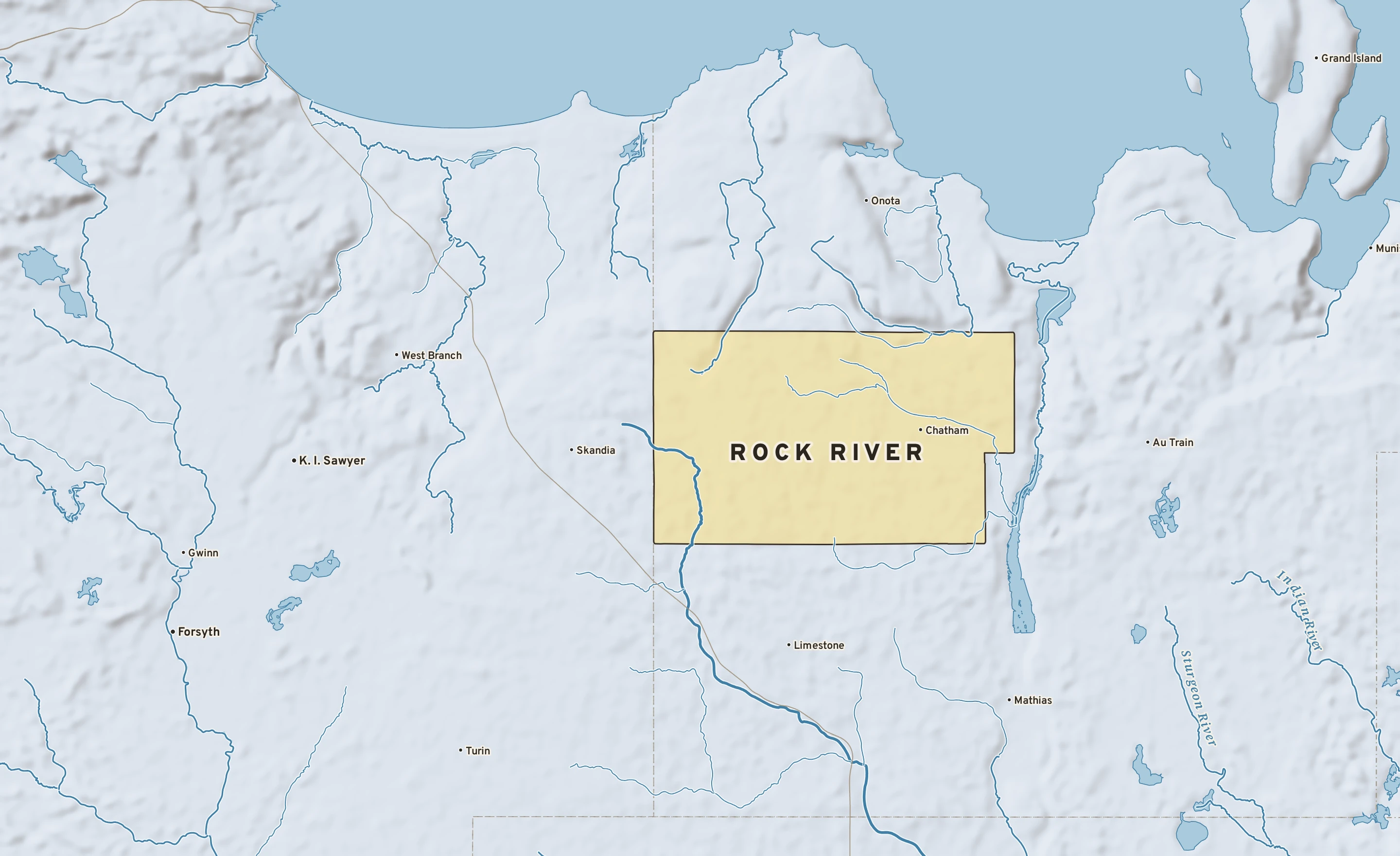 Shaded-relief atlas plate of Rock River, Michigan: rivers, roads, the city limits and where the water drains.
