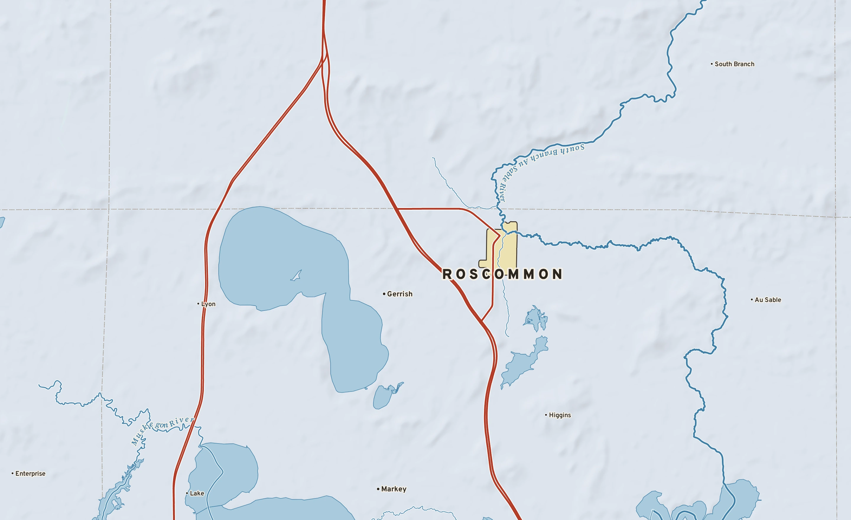 Shaded-relief atlas plate of Roscommon, Michigan: rivers, roads, the city limits and where the water drains.