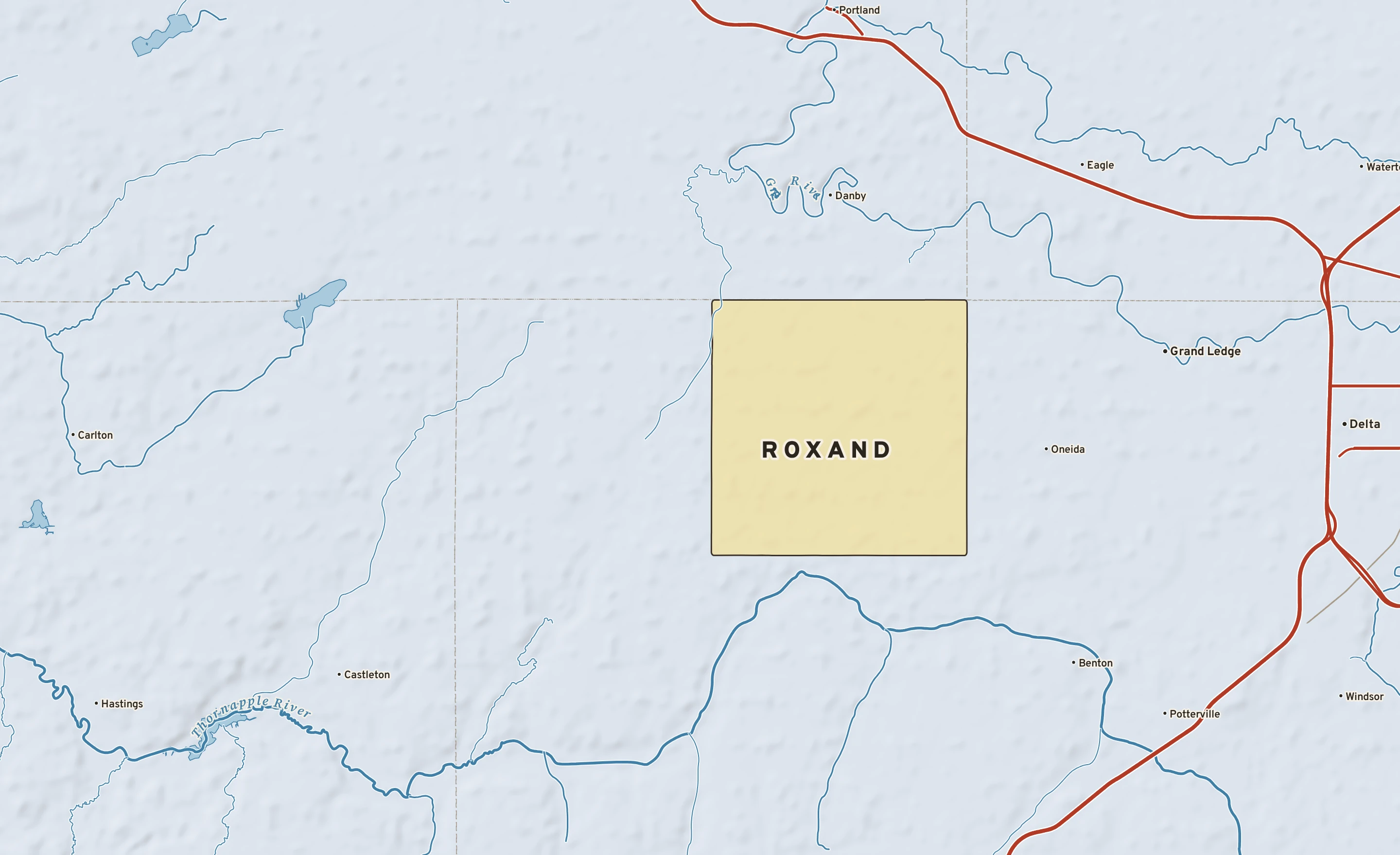 Shaded-relief atlas plate of Roxand, Michigan: rivers, roads, the city limits and where the water drains.
