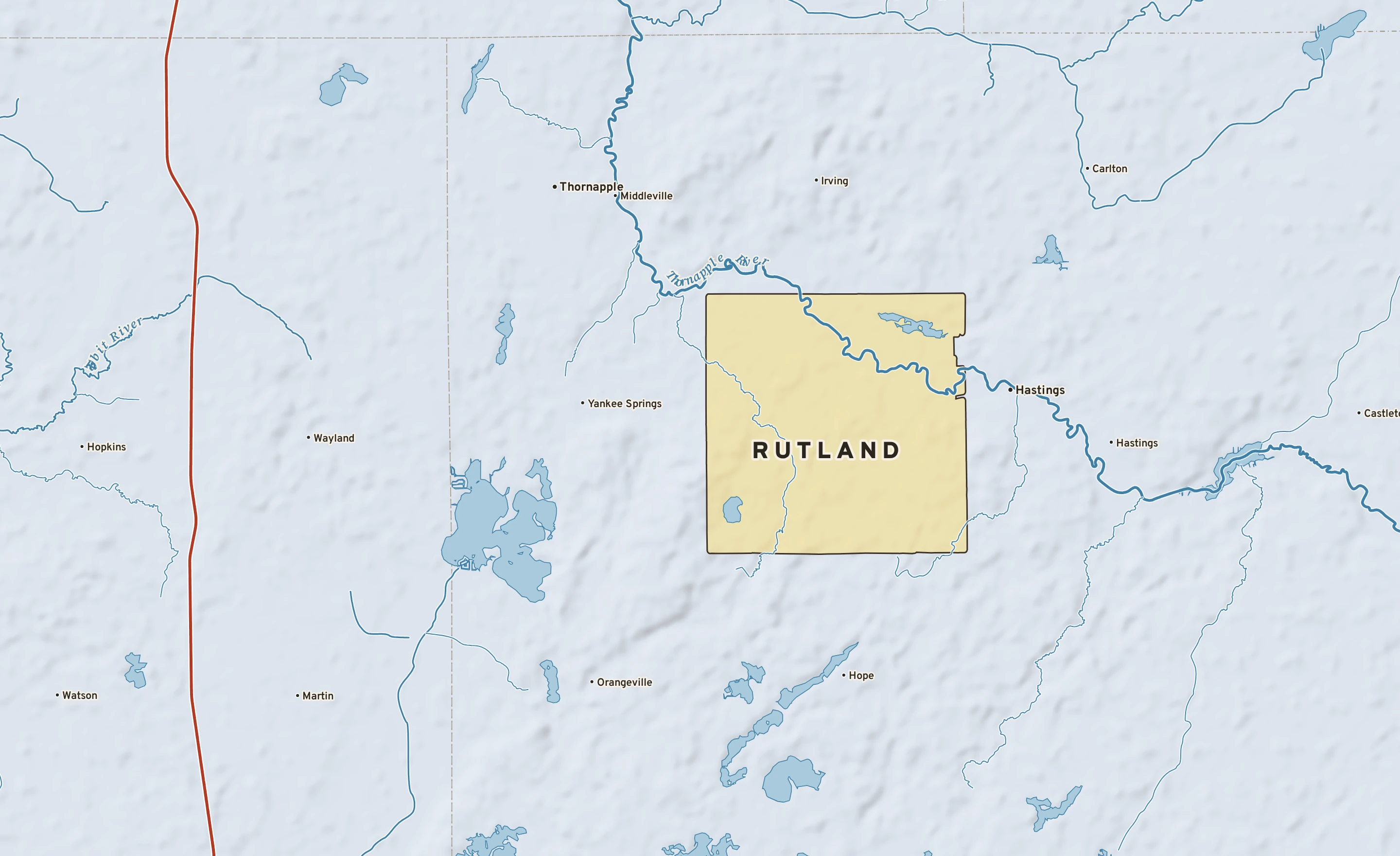 Shaded-relief atlas plate of Rutland, Michigan: rivers, roads, the city limits and where the water drains.