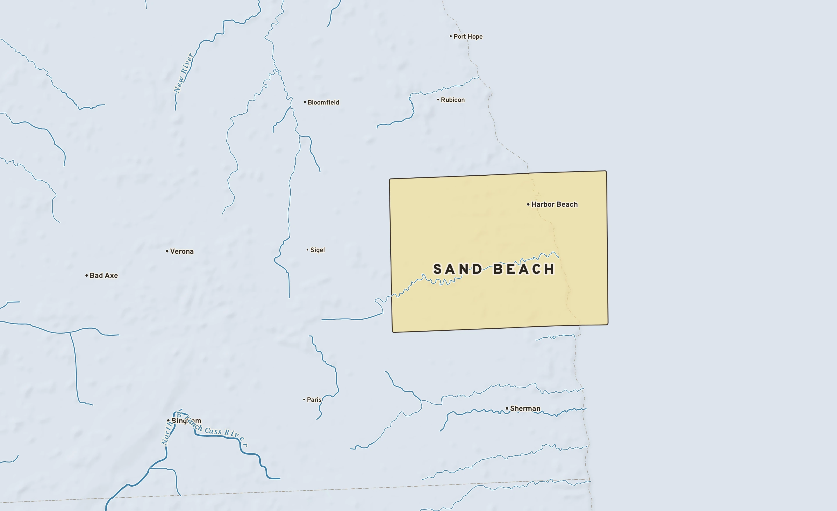 Shaded-relief atlas plate of Sand Beach, Michigan: rivers, roads, the city limits and where the water drains.