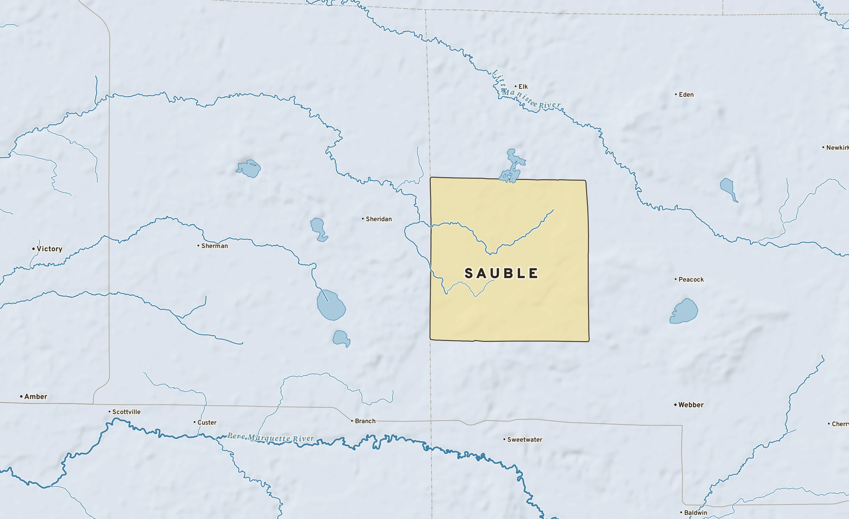 Shaded-relief atlas plate of Sauble, Michigan: rivers, roads, the city limits and where the water drains.