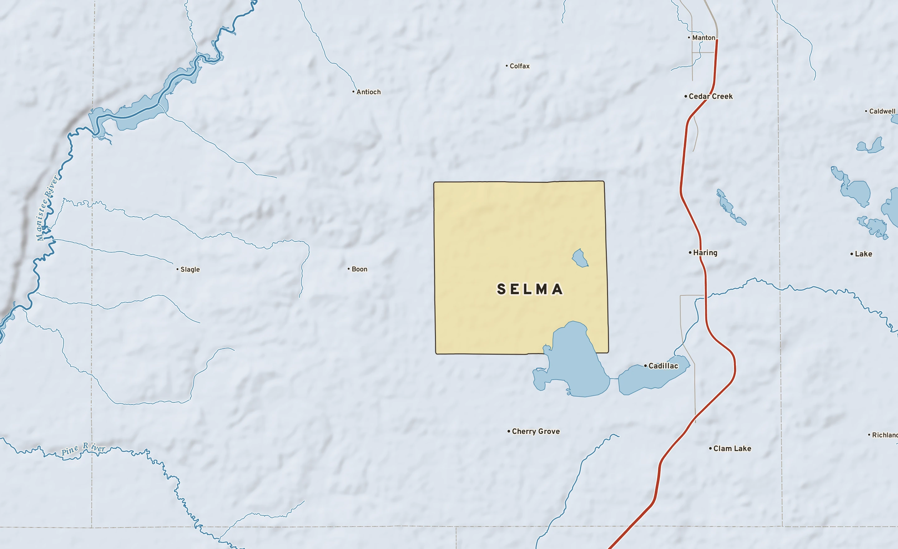 Shaded-relief atlas plate of Selma, Michigan: rivers, roads, the city limits and where the water drains.