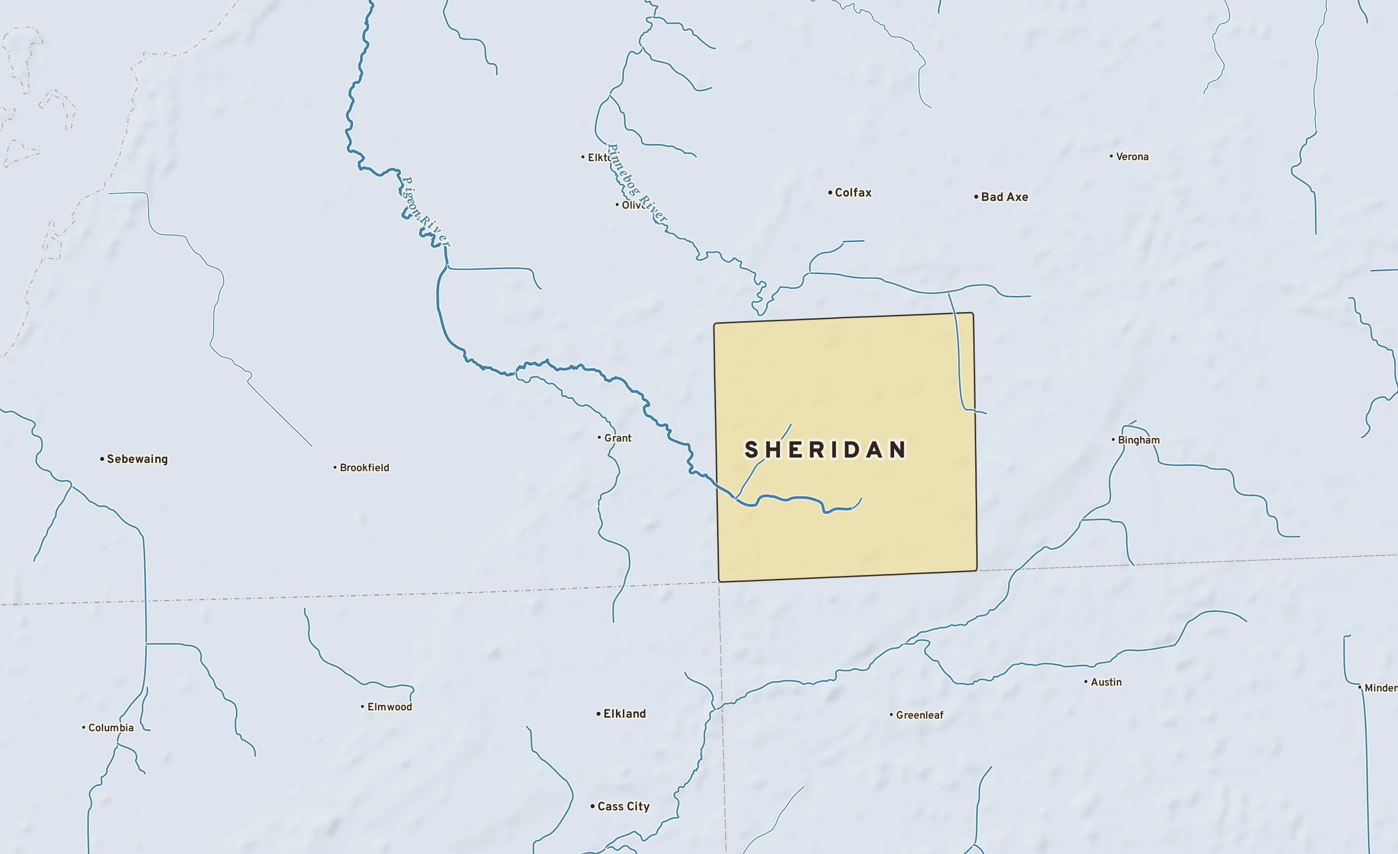 Shaded-relief atlas plate of Sheridan, Michigan: rivers, roads, the city limits and where the water drains.