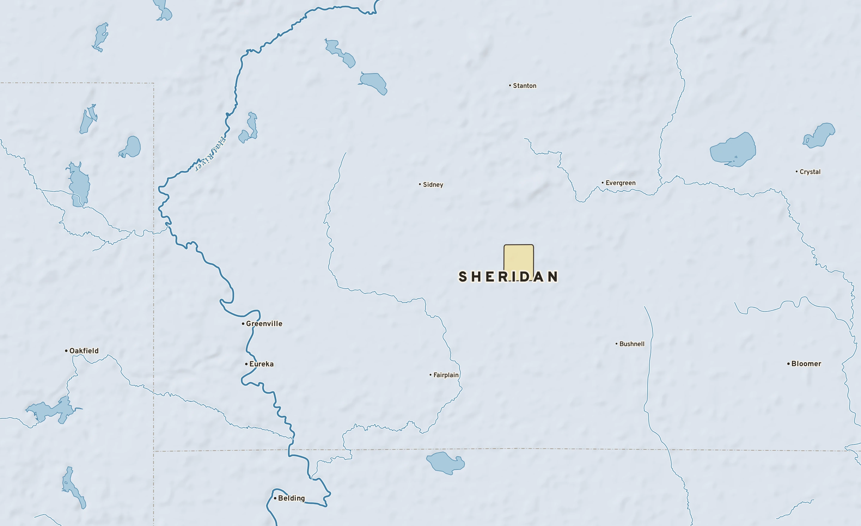 Shaded-relief atlas plate of Sheridan, Michigan: rivers, roads, the city limits and where the water drains.