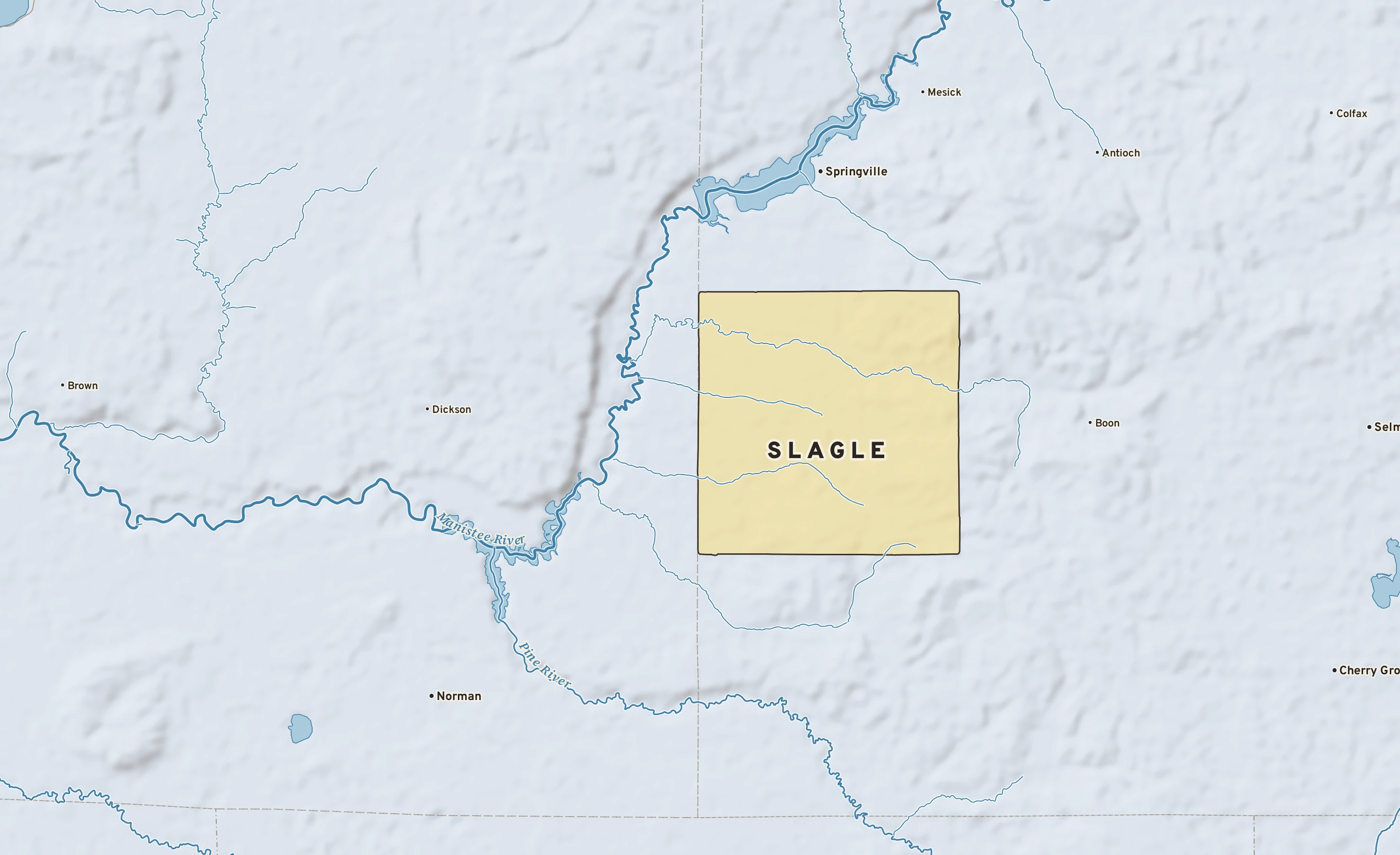 Shaded-relief atlas plate of Slagle, Michigan: rivers, roads, the city limits and where the water drains.