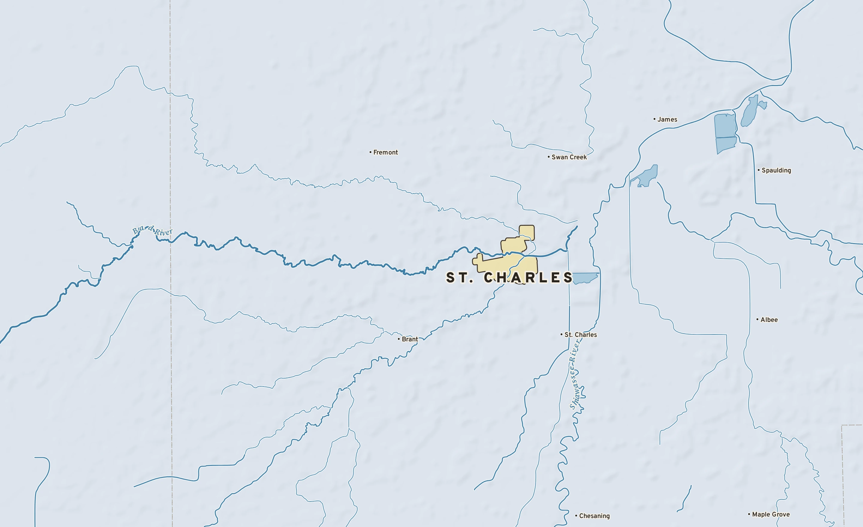 Shaded-relief atlas plate of St. Charles, Michigan: rivers, roads, the city limits and where the water drains.