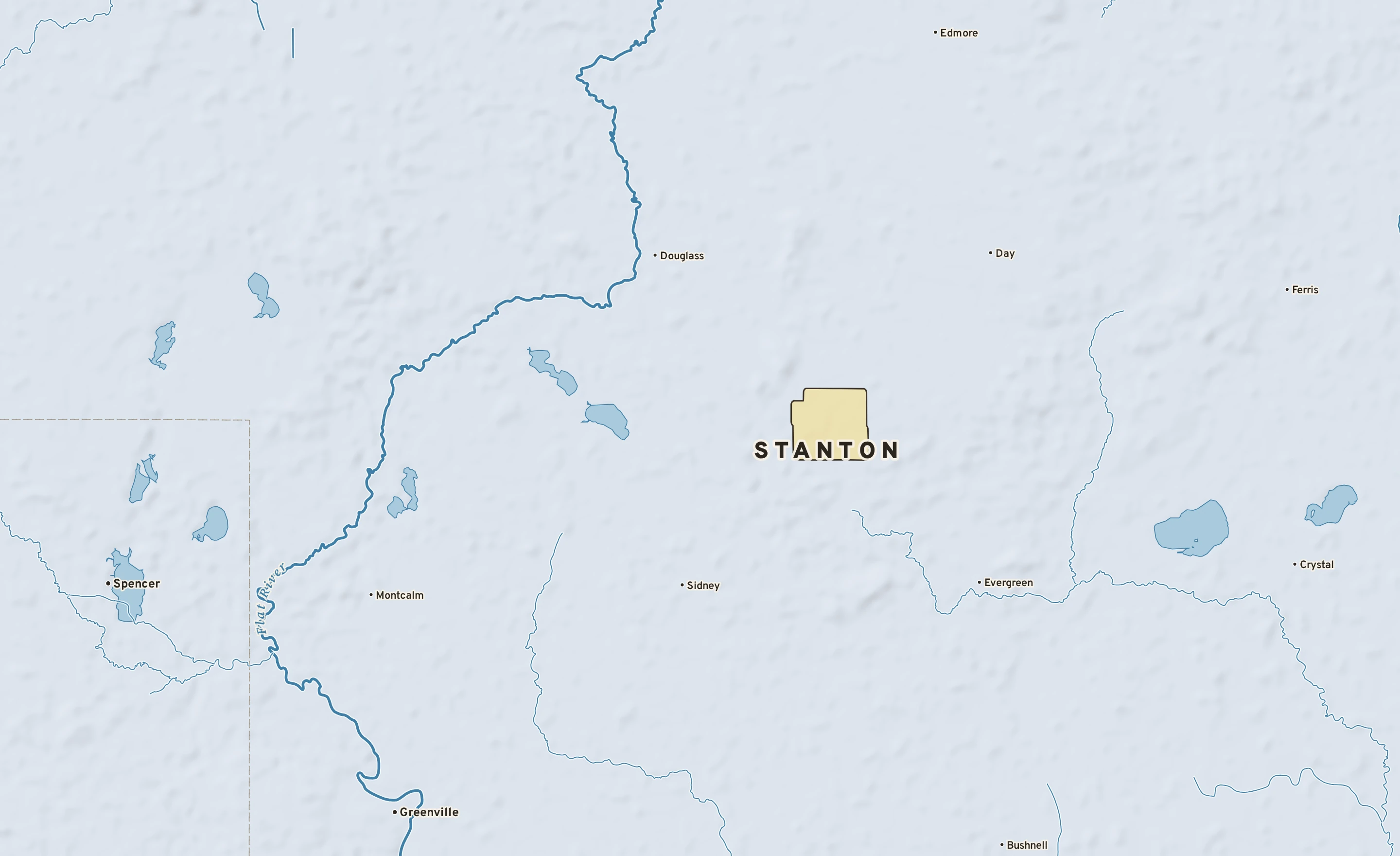 Shaded-relief atlas plate of Stanton, Michigan: rivers, roads, the city limits and where the water drains.