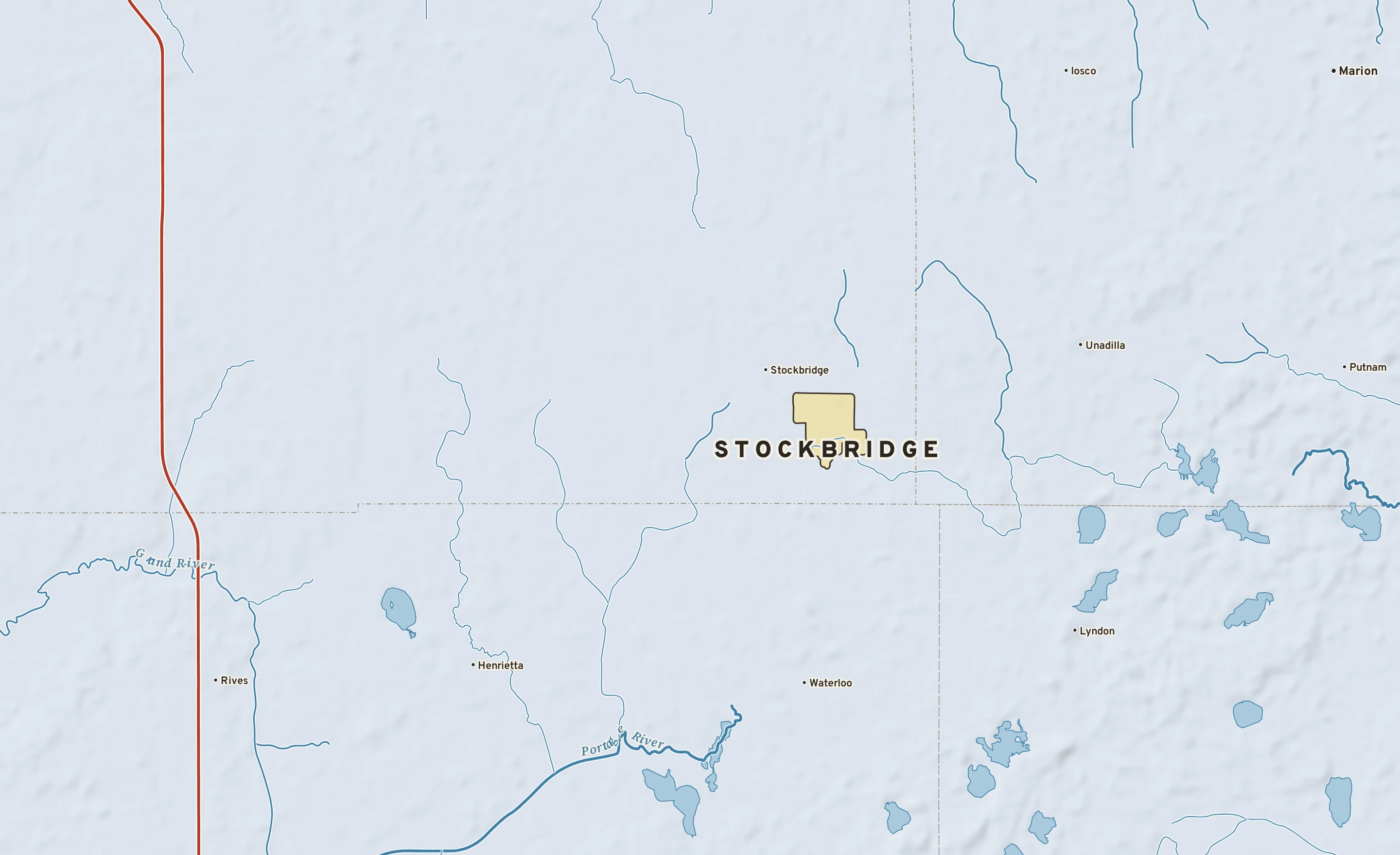 Shaded-relief atlas plate of Stockbridge, Michigan: rivers, roads, the city limits and where the water drains.