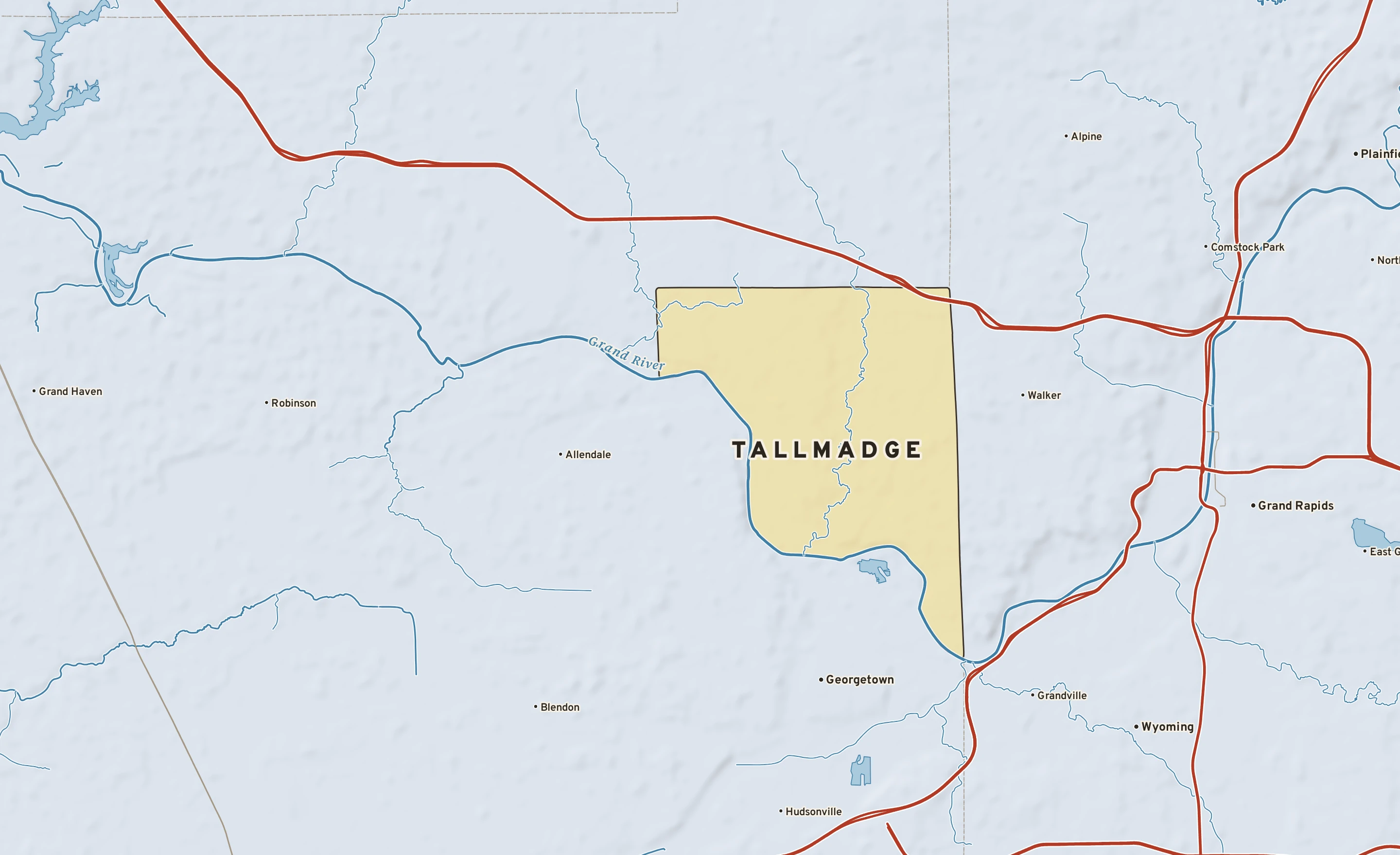 Shaded-relief atlas plate of Tallmadge, Michigan: rivers, roads, the city limits and where the water drains.