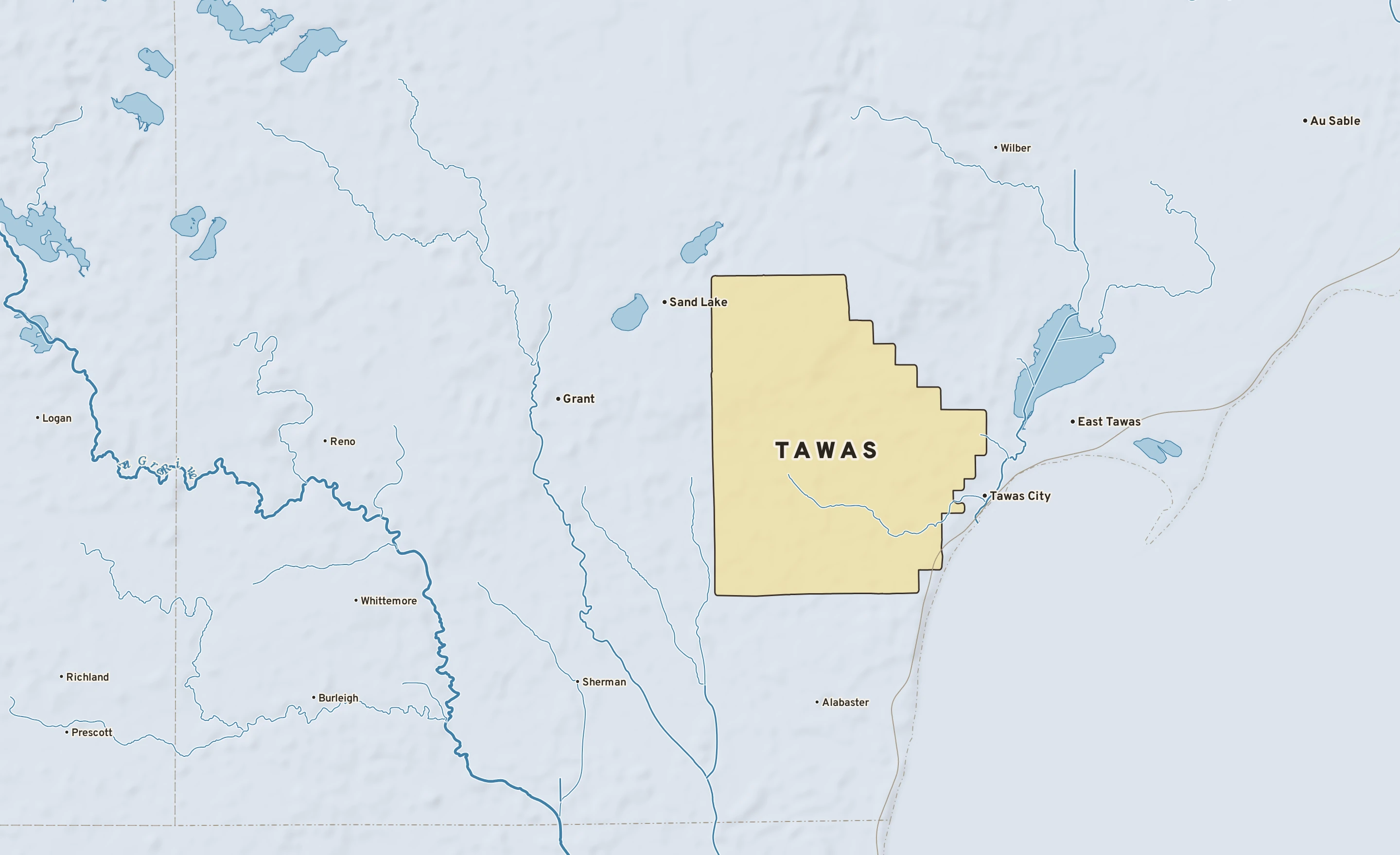 Shaded-relief atlas plate of Tawas, Michigan: rivers, roads, the city limits and where the water drains.