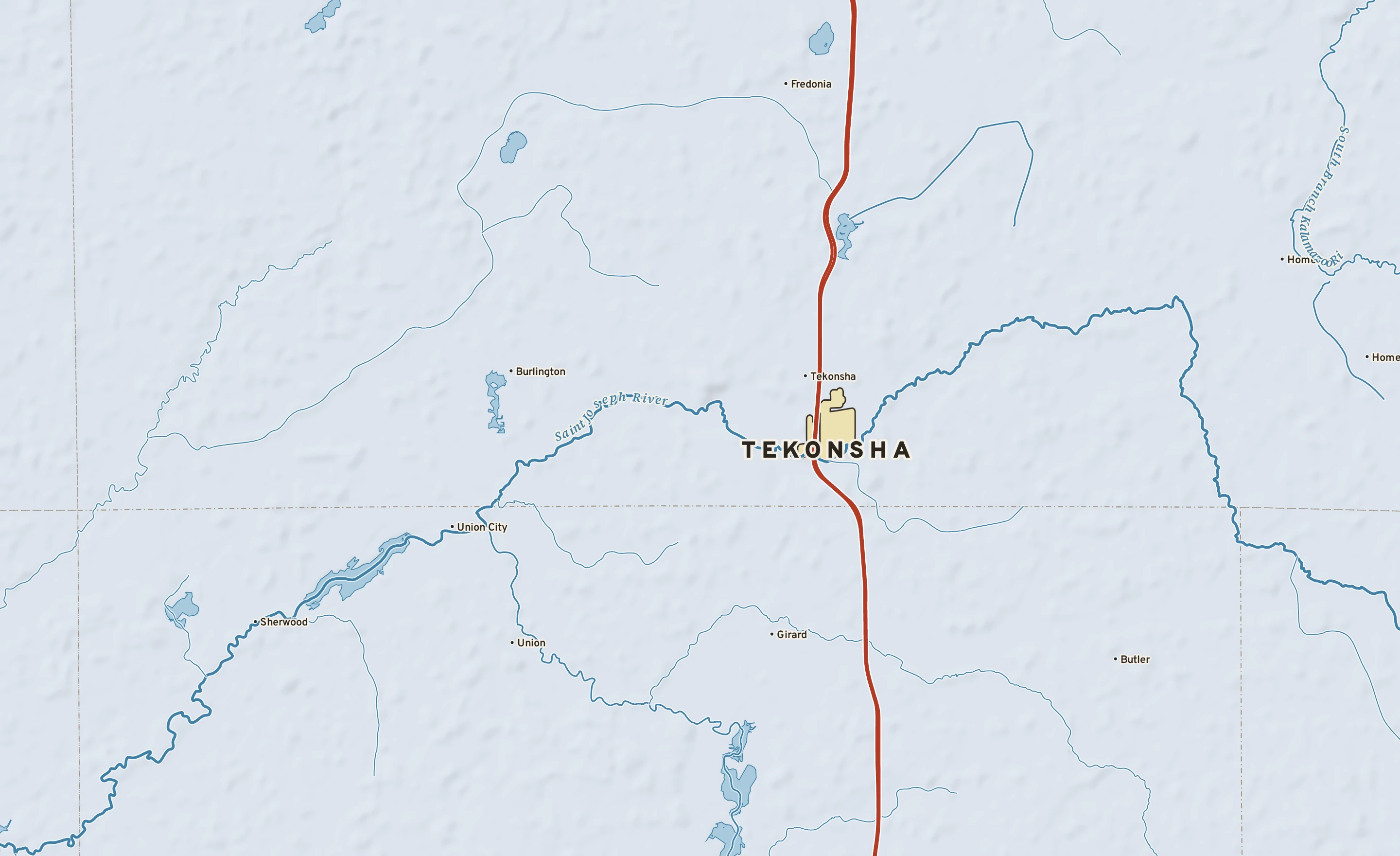 Shaded-relief atlas plate of Tekonsha, Michigan: rivers, roads, the city limits and where the water drains.