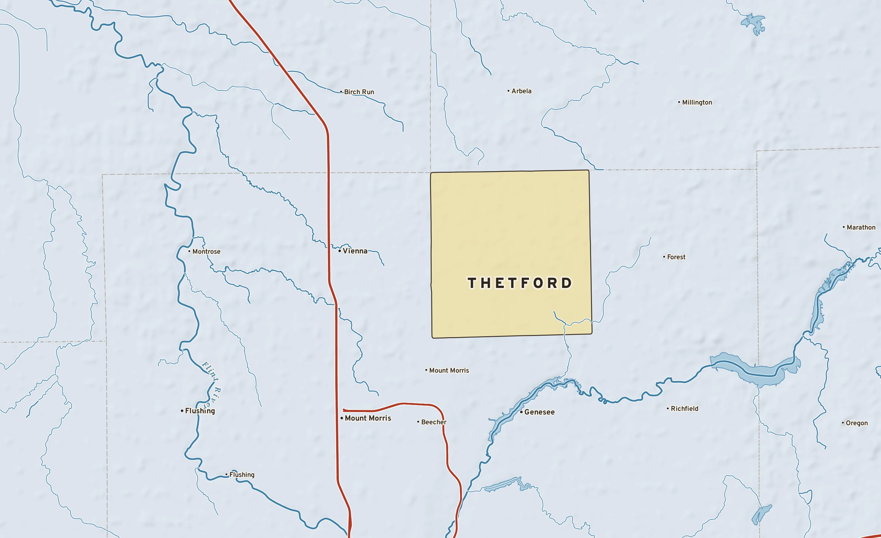 Shaded-relief atlas plate of Thetford, Michigan: rivers, roads, the city limits and where the water drains.
