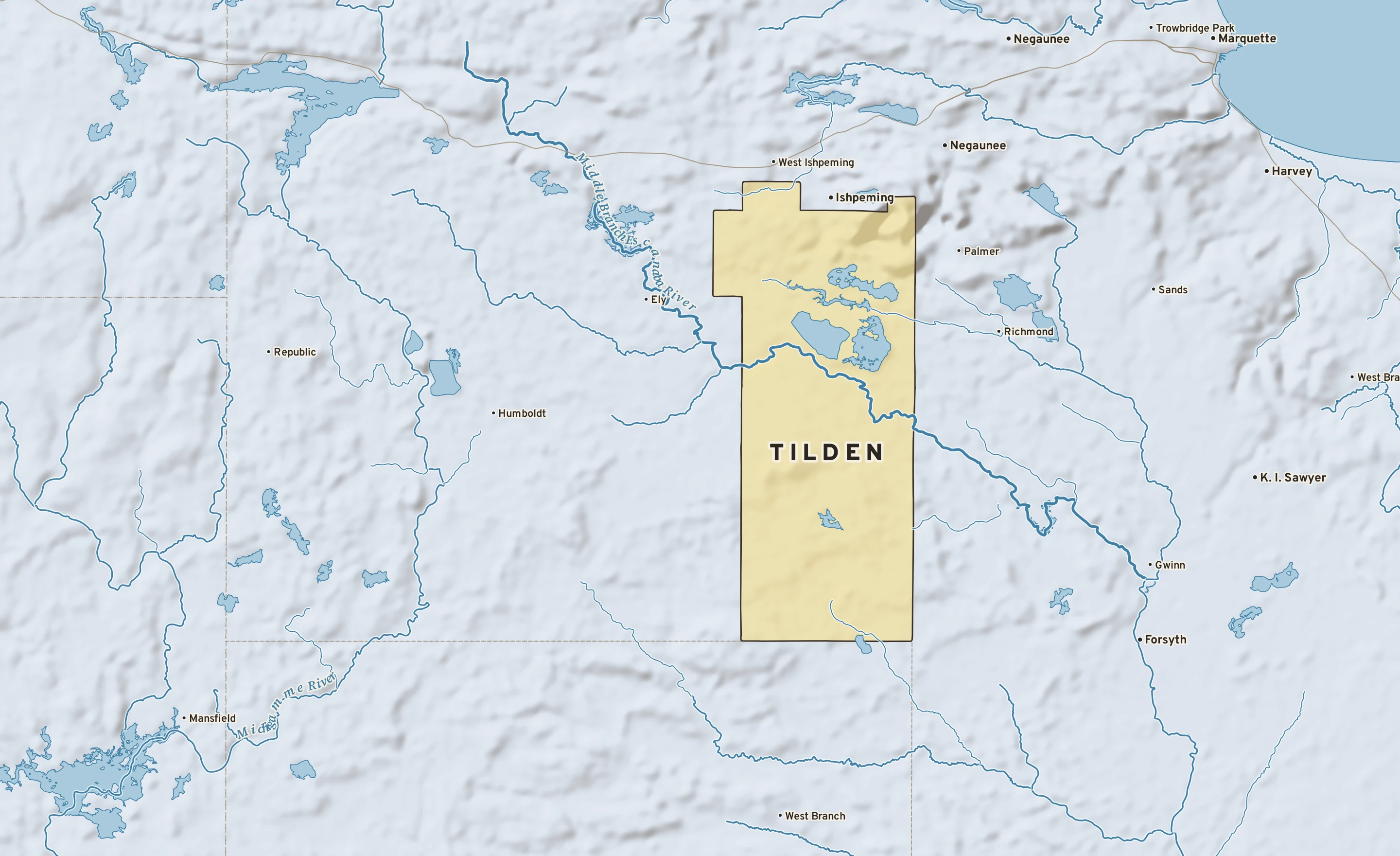 Shaded-relief atlas plate of Tilden, Michigan: rivers, roads, the city limits and where the water drains.