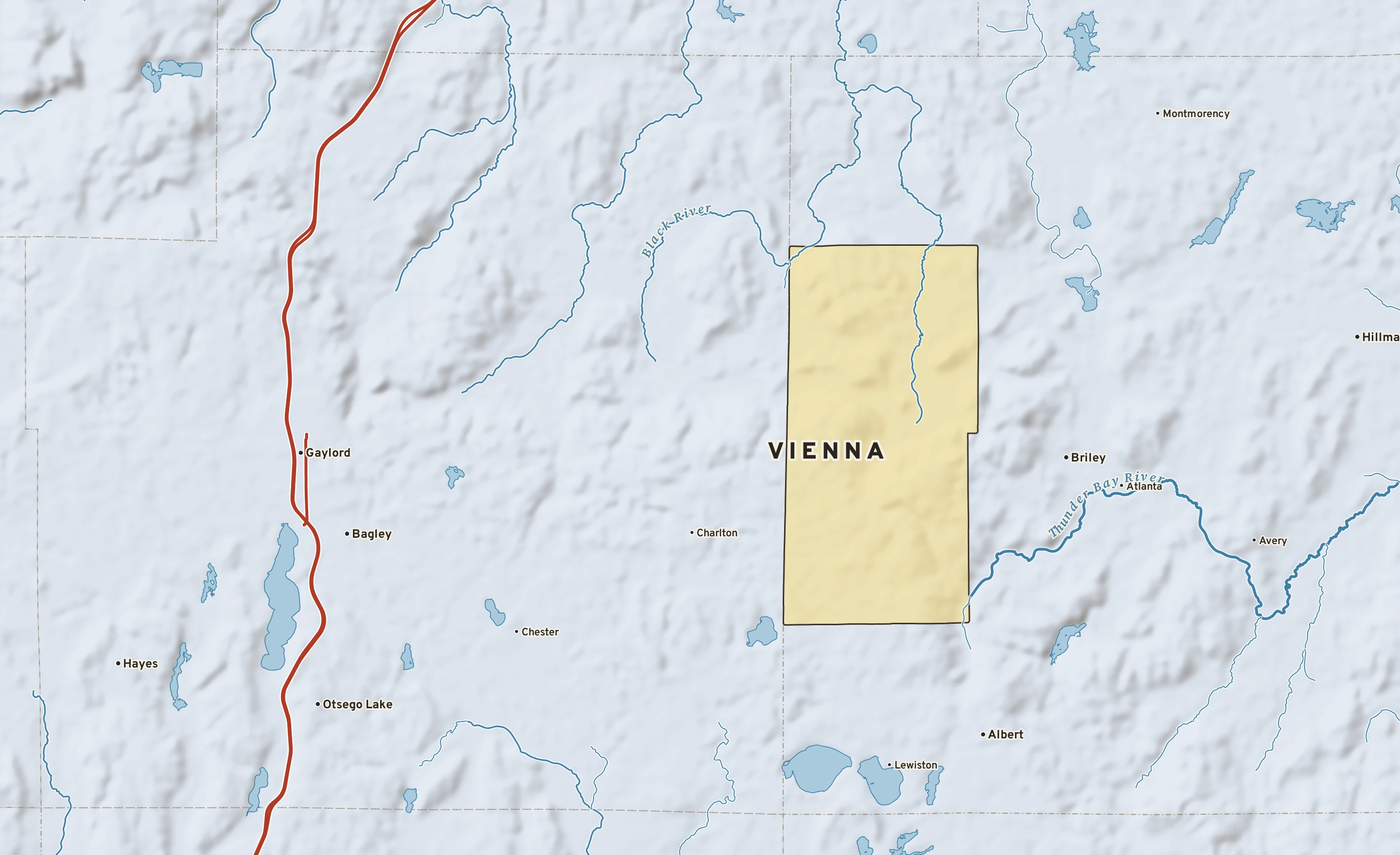 Shaded-relief atlas plate of Vienna, Michigan: rivers, roads, the city limits and where the water drains.