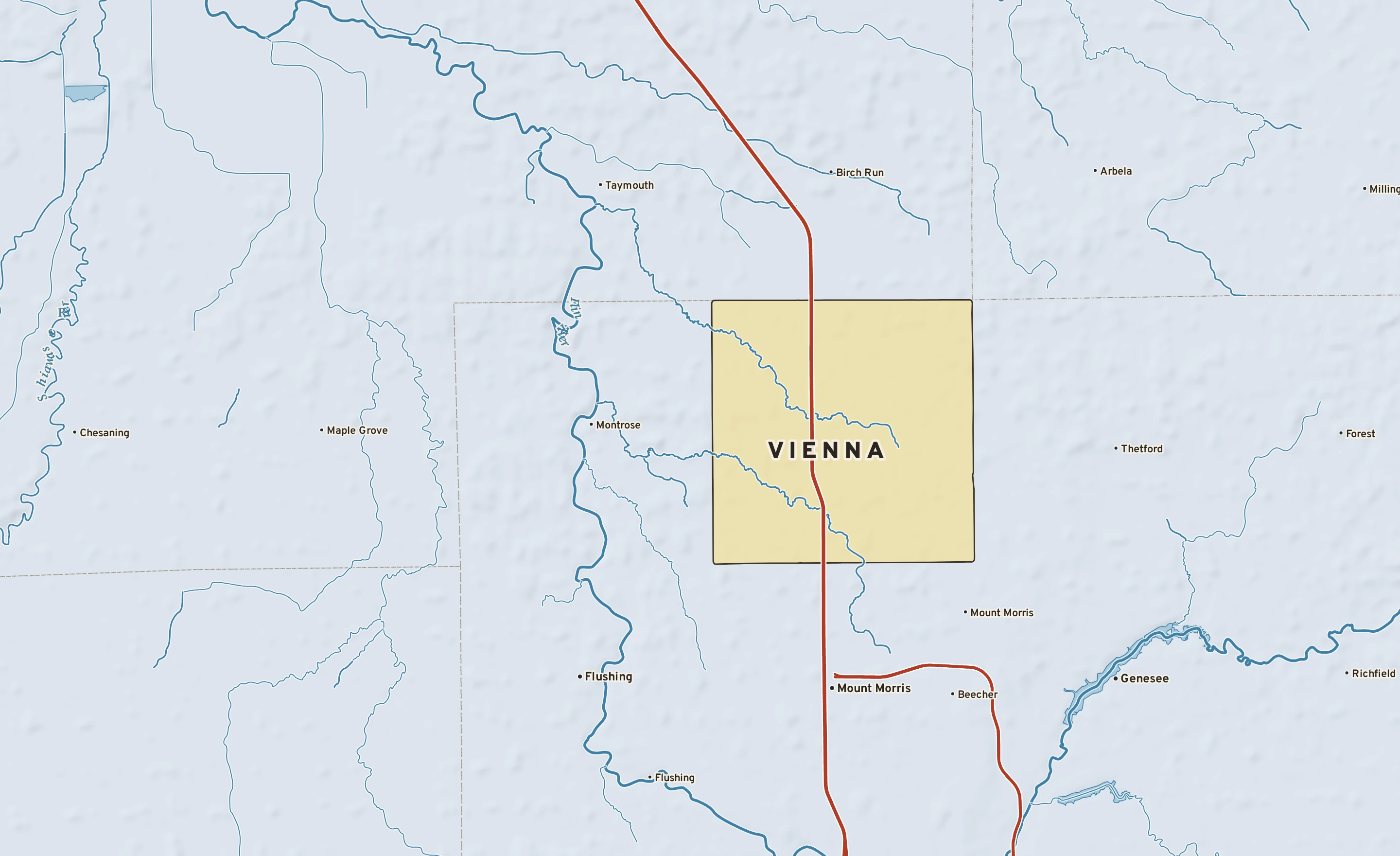 Shaded-relief atlas plate of Vienna, Michigan: rivers, roads, the city limits and where the water drains.