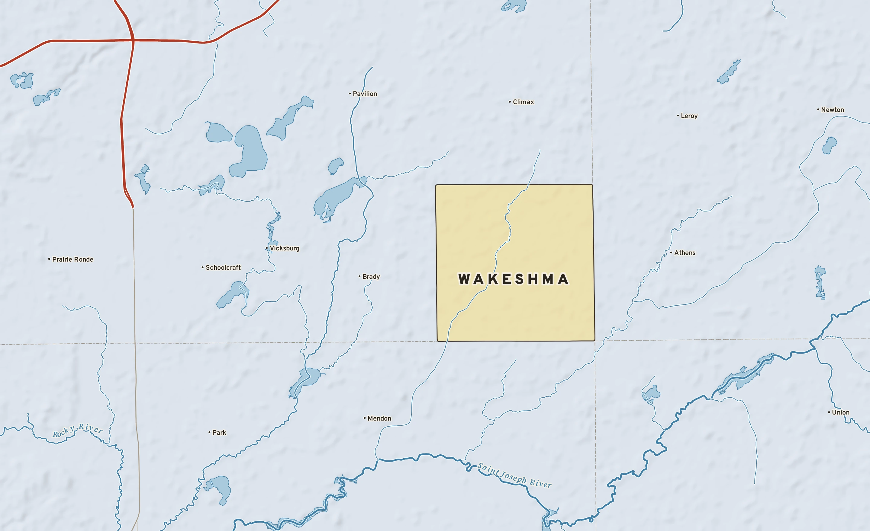 Shaded-relief atlas plate of Wakeshma, Michigan: rivers, roads, the city limits and where the water drains.