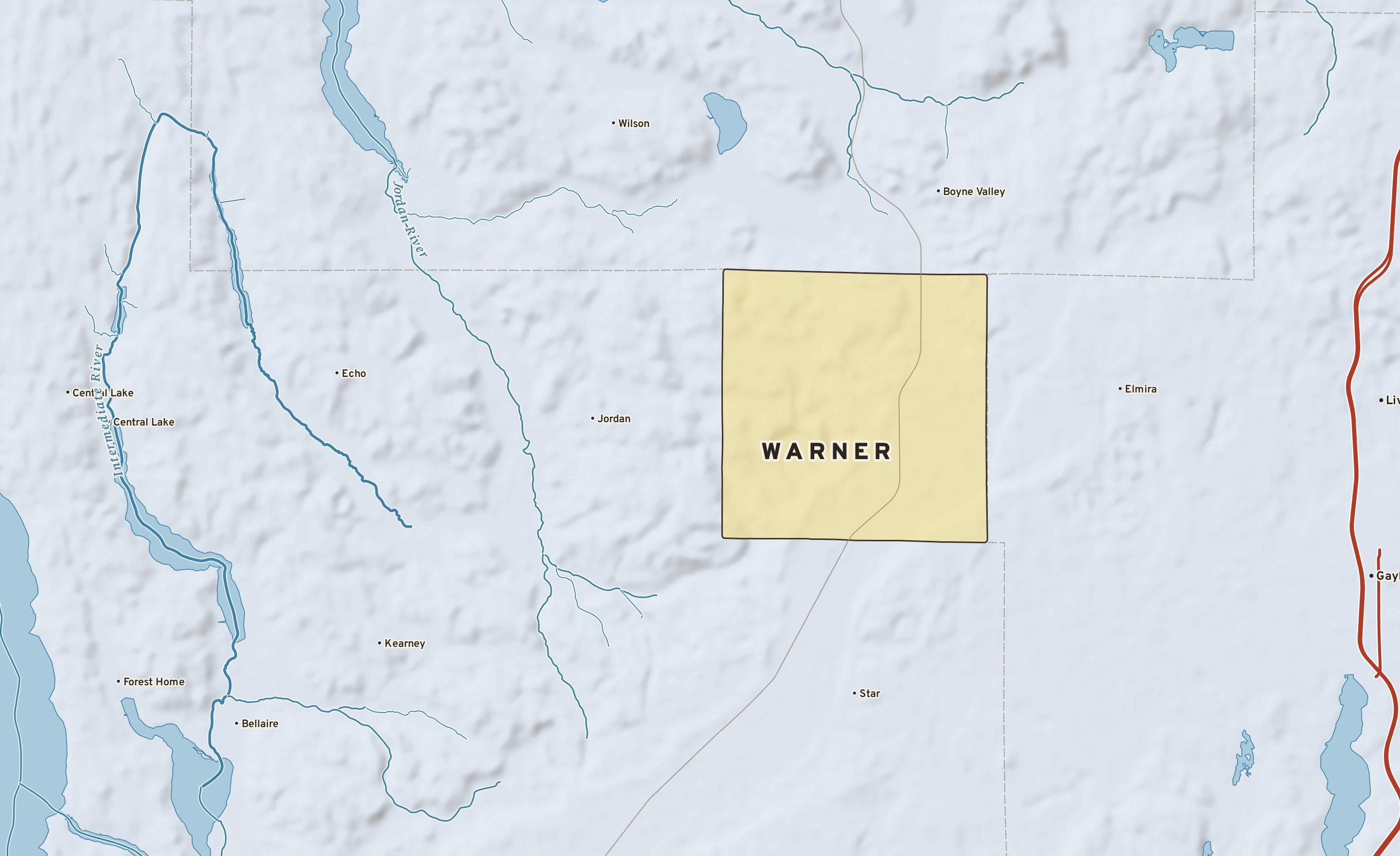 Shaded-relief atlas plate of Warner, Michigan: rivers, roads, the city limits and where the water drains.