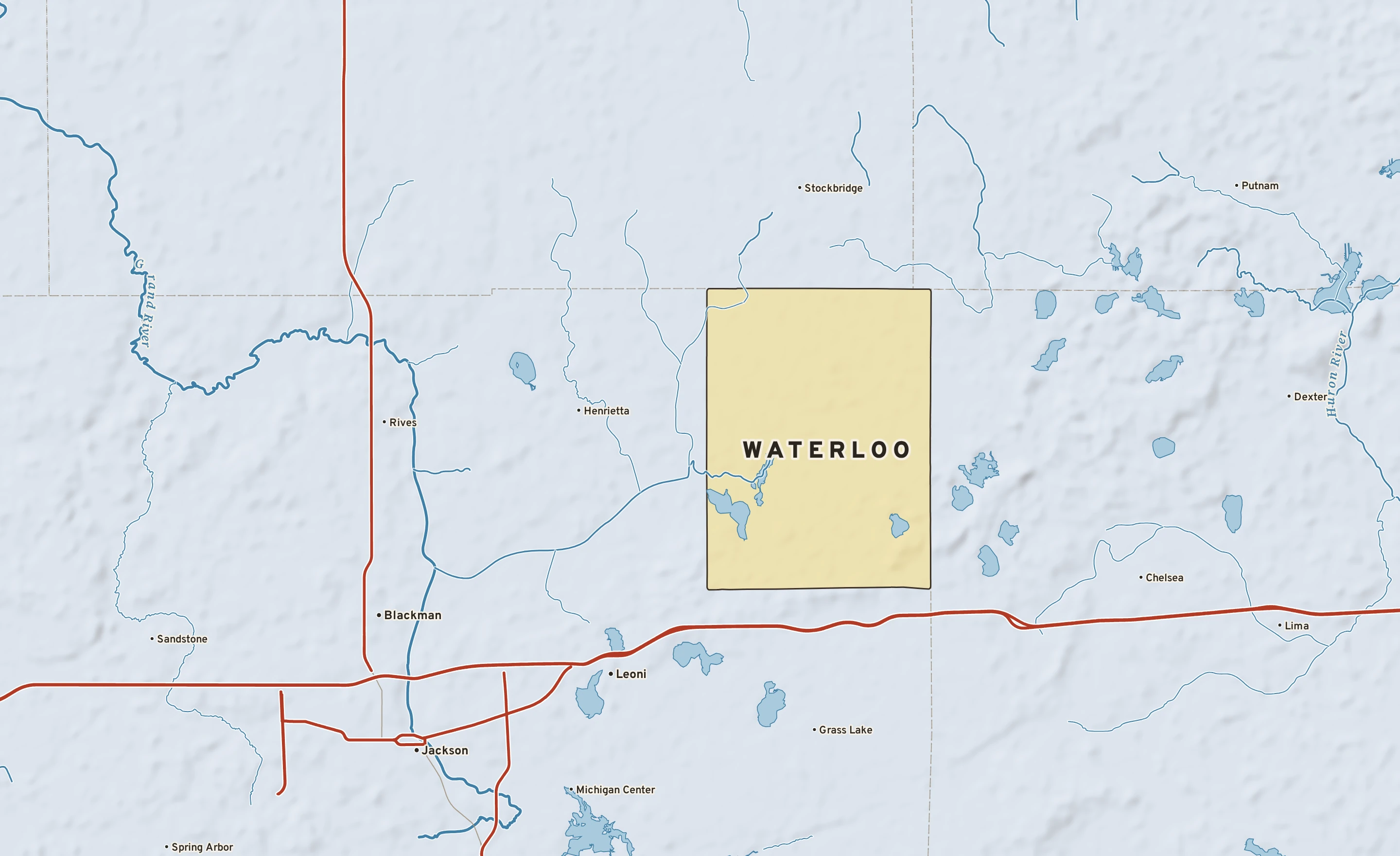Shaded-relief atlas plate of Waterloo, Michigan: rivers, roads, the city limits and where the water drains.