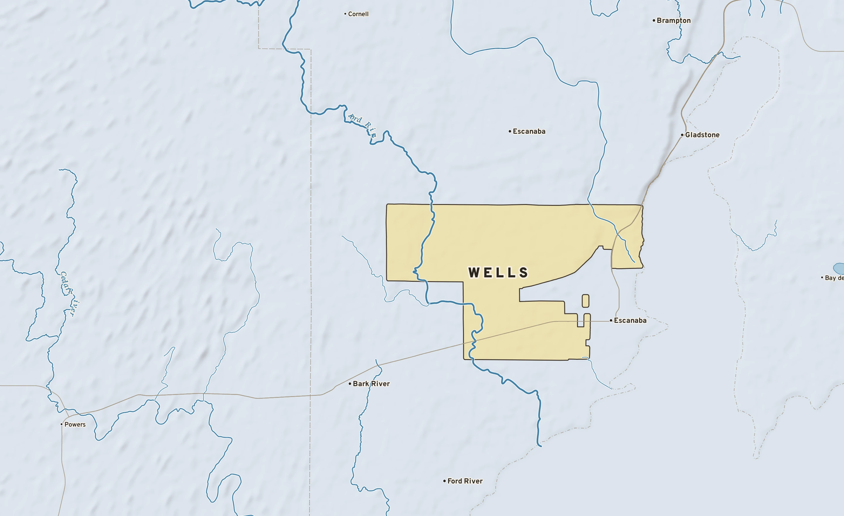 Shaded-relief atlas plate of Wells, Michigan: rivers, roads, the city limits and where the water drains.