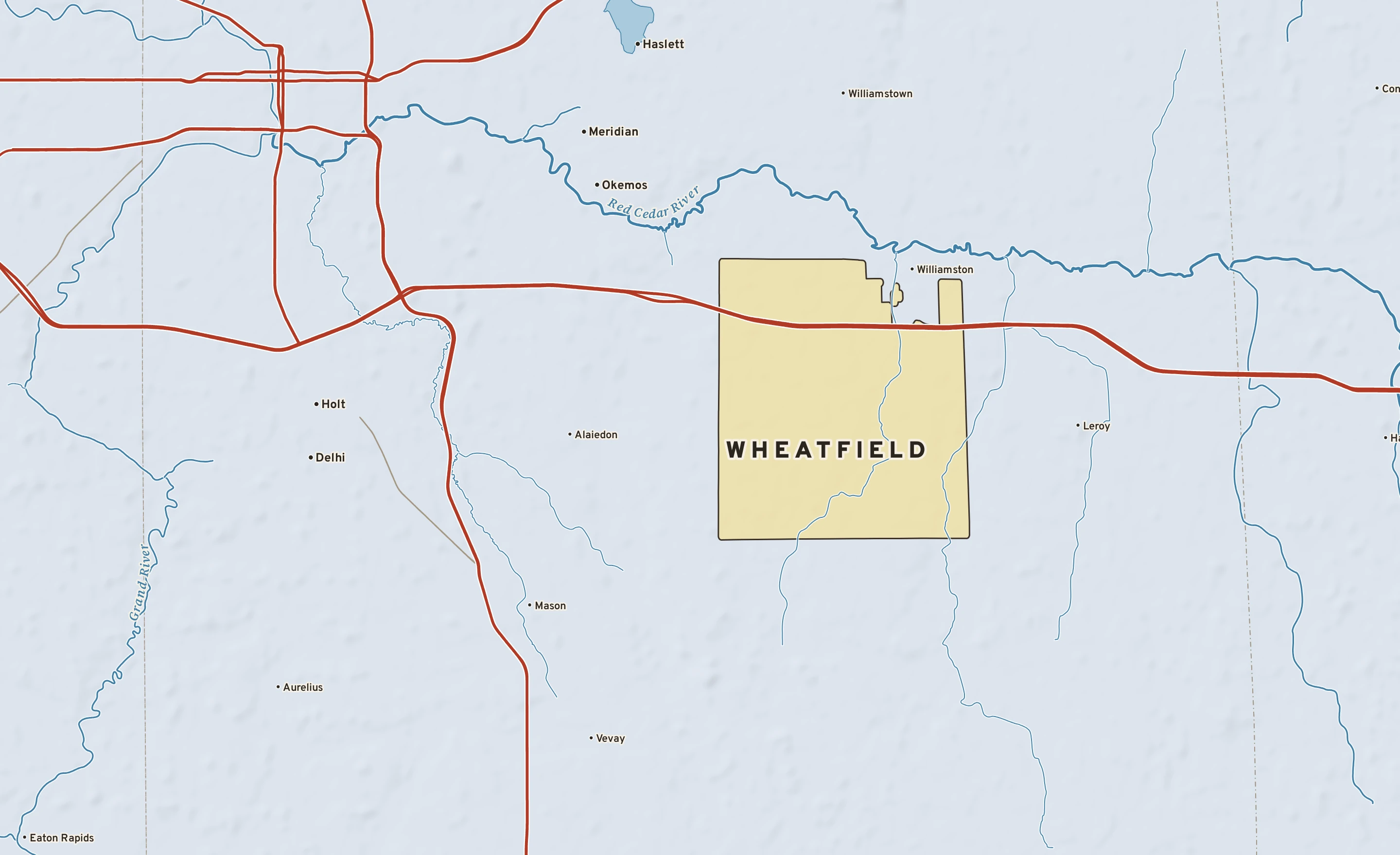 Shaded-relief atlas plate of Wheatfield, Michigan: rivers, roads, the city limits and where the water drains.