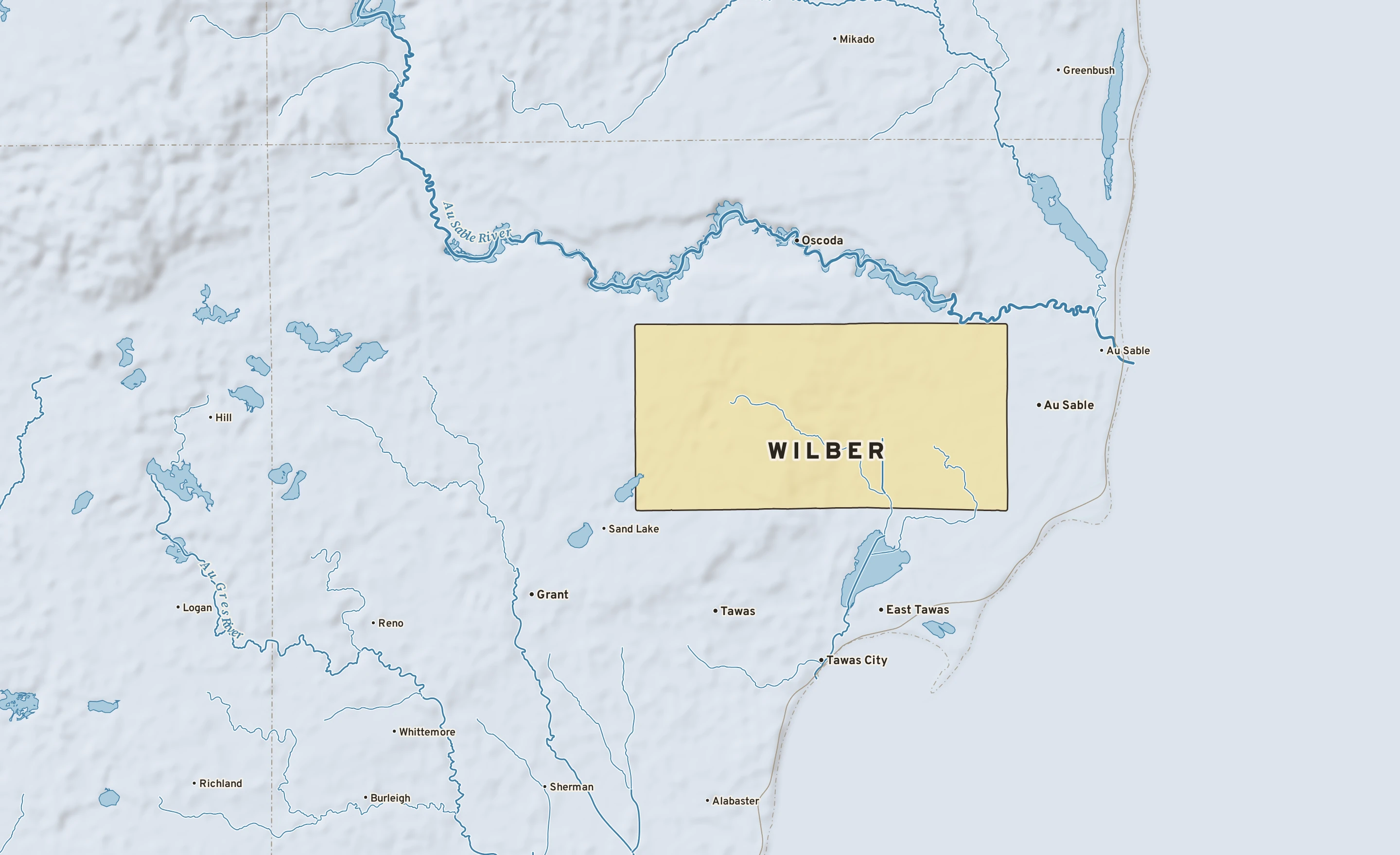 Shaded-relief atlas plate of Wilber, Michigan: rivers, roads, the city limits and where the water drains.
