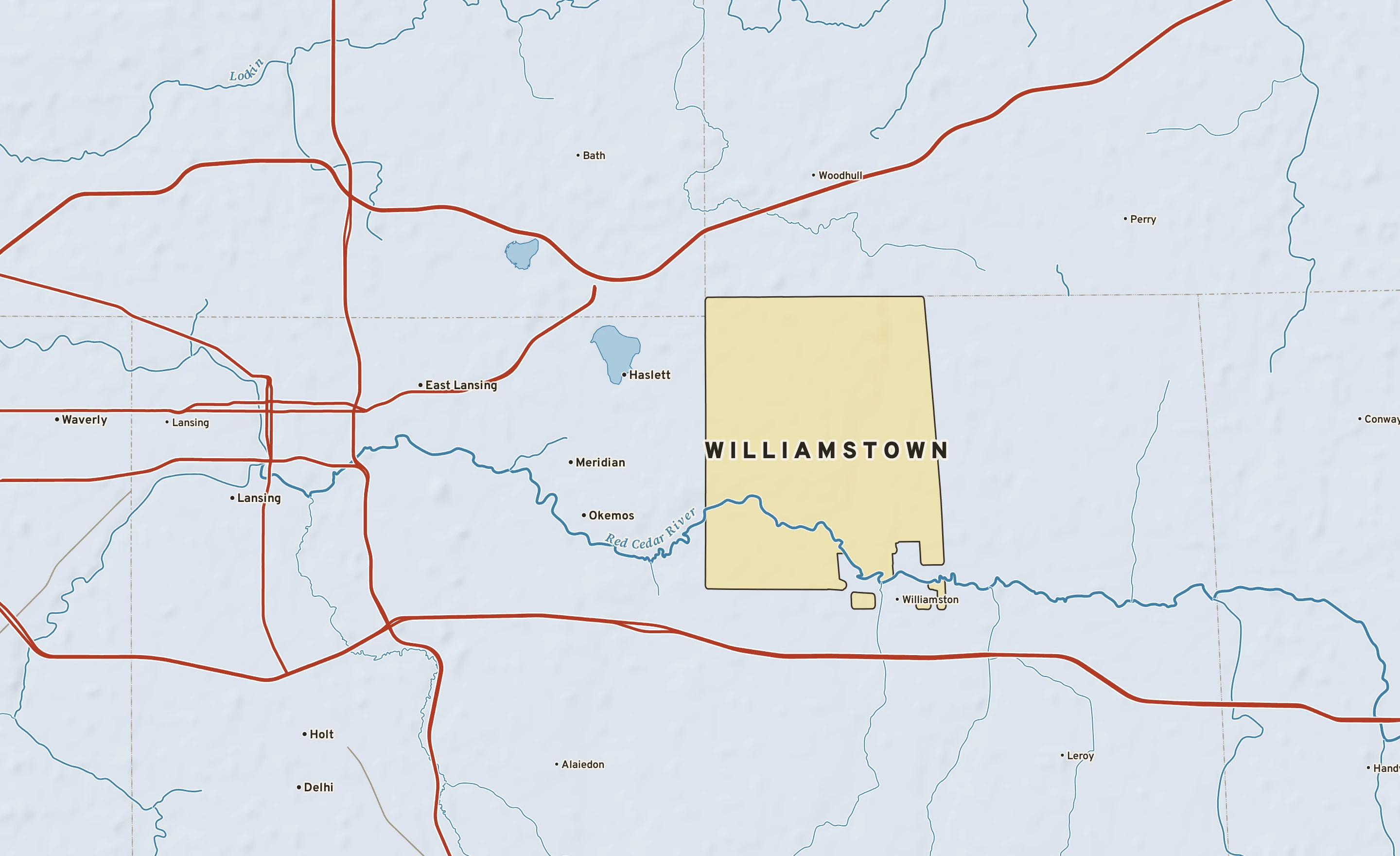 Shaded-relief atlas plate of Williamstown, Michigan: rivers, roads, the city limits and where the water drains.