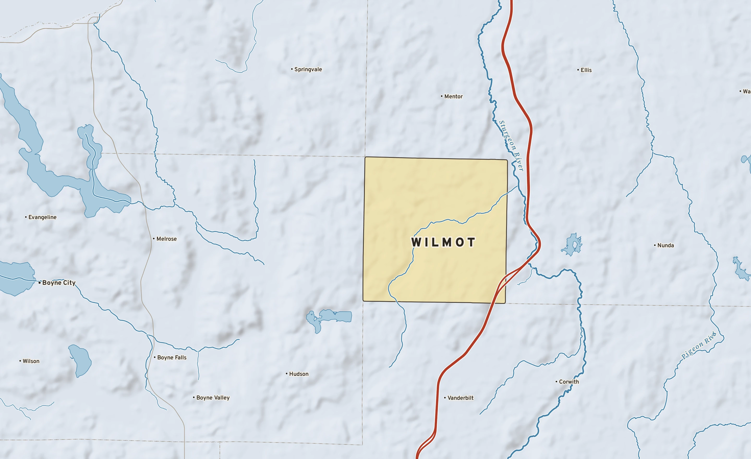 Shaded-relief atlas plate of Wilmot, Michigan: rivers, roads, the city limits and where the water drains.