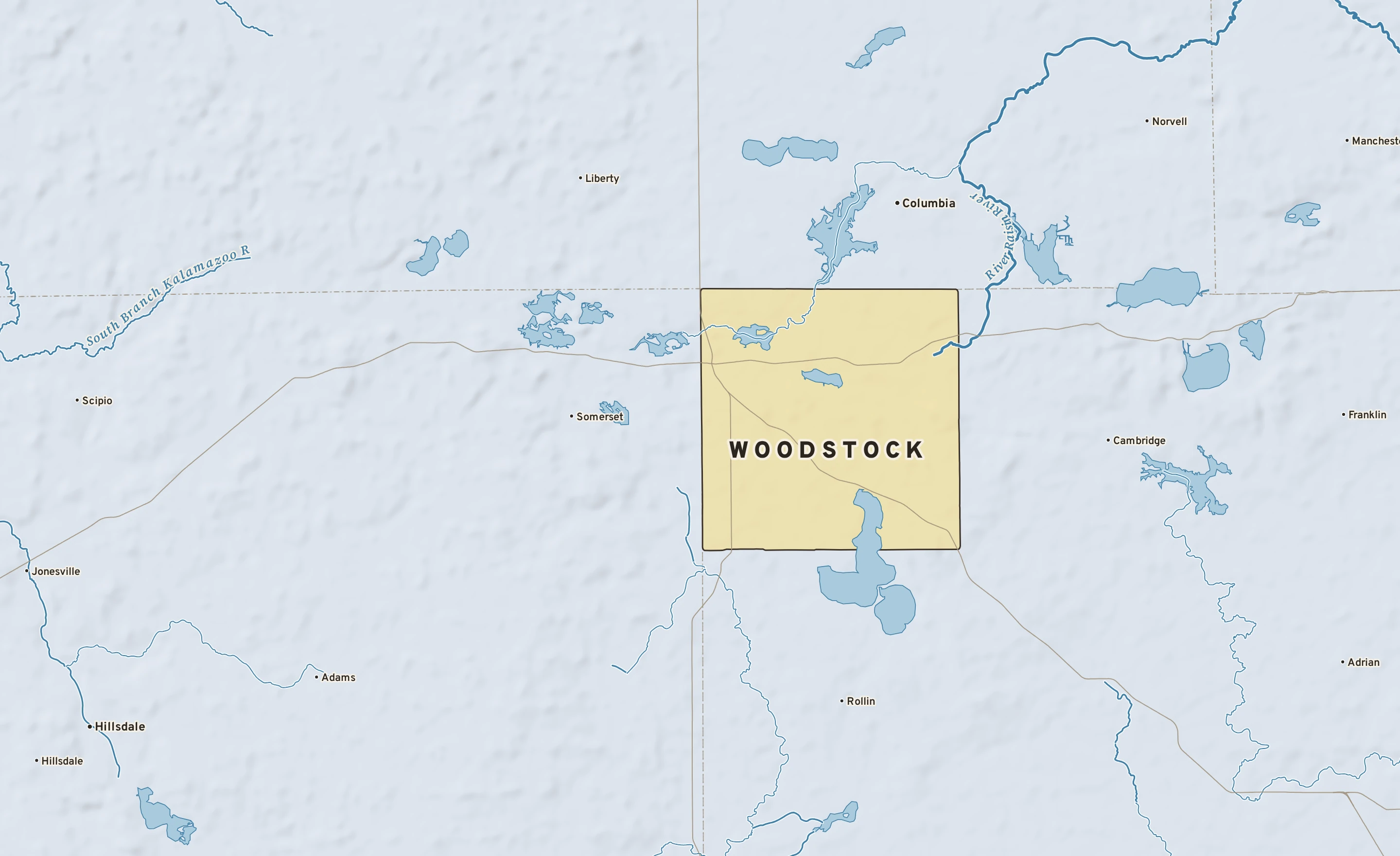 Shaded-relief atlas plate of Woodstock, Michigan: rivers, roads, the city limits and where the water drains.