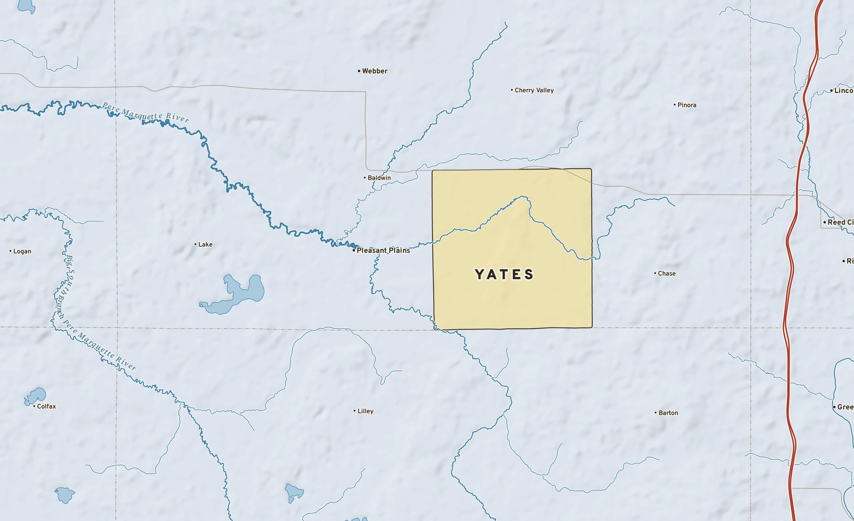 Shaded-relief atlas plate of Yates, Michigan: rivers, roads, the city limits and where the water drains.