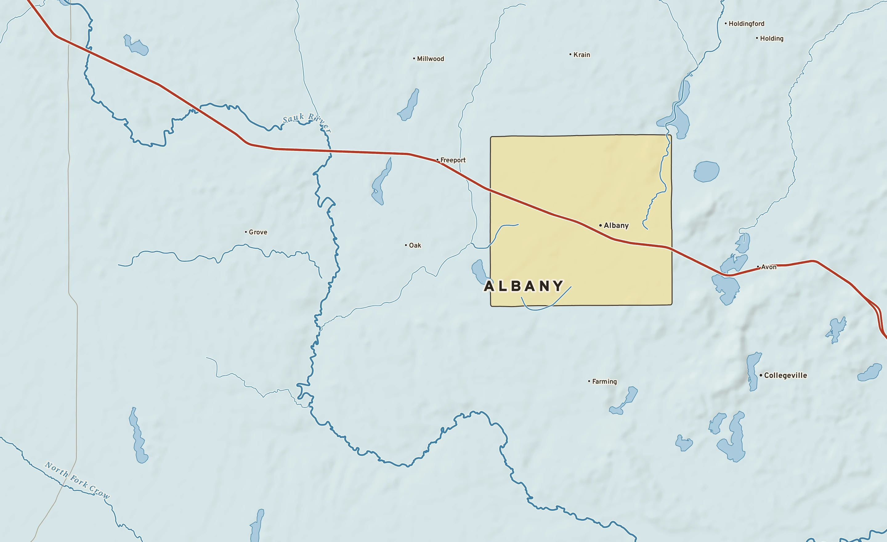 Shaded-relief atlas plate of Albany, Minnesota: rivers, roads, the city limits and where the water drains.