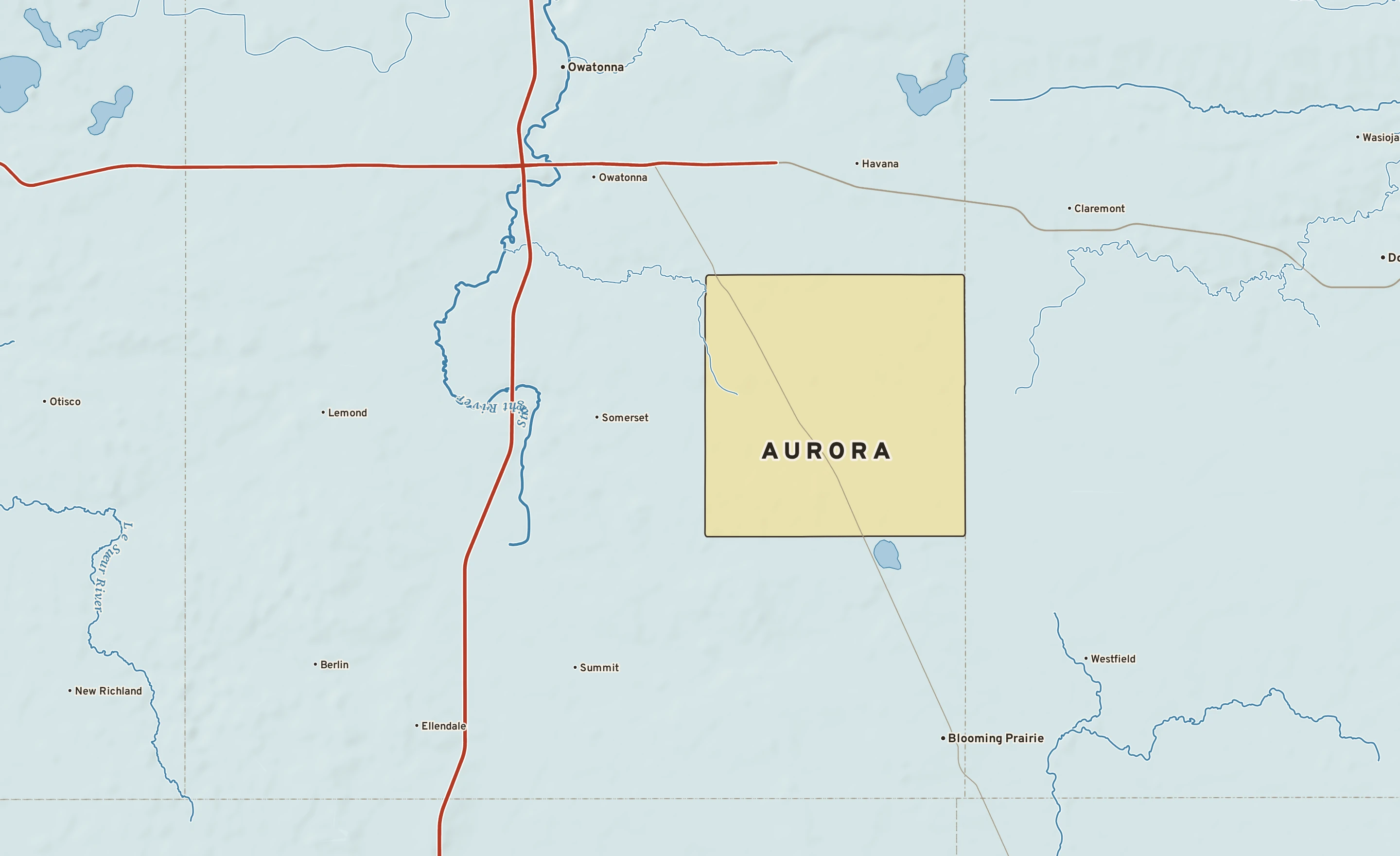 Shaded-relief atlas plate of Aurora, Minnesota: rivers, roads, the city limits and where the water drains.