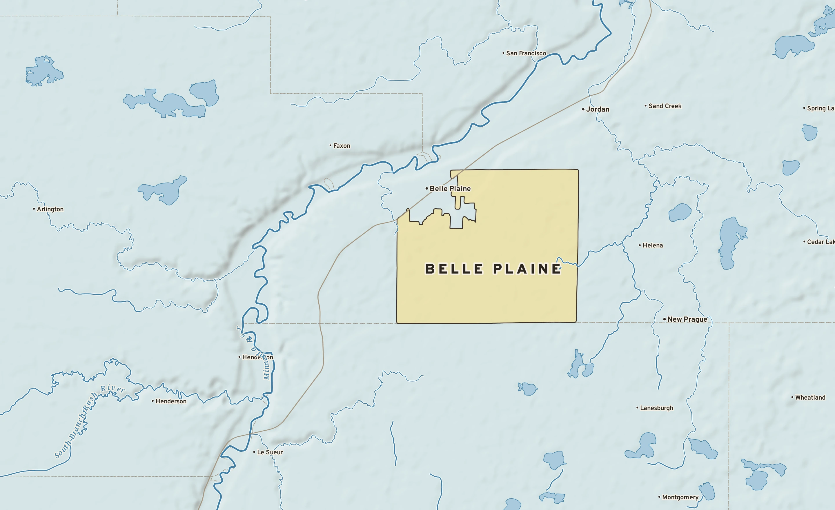 Shaded-relief atlas plate of Belle Plaine, Minnesota: rivers, roads, the city limits and where the water drains.