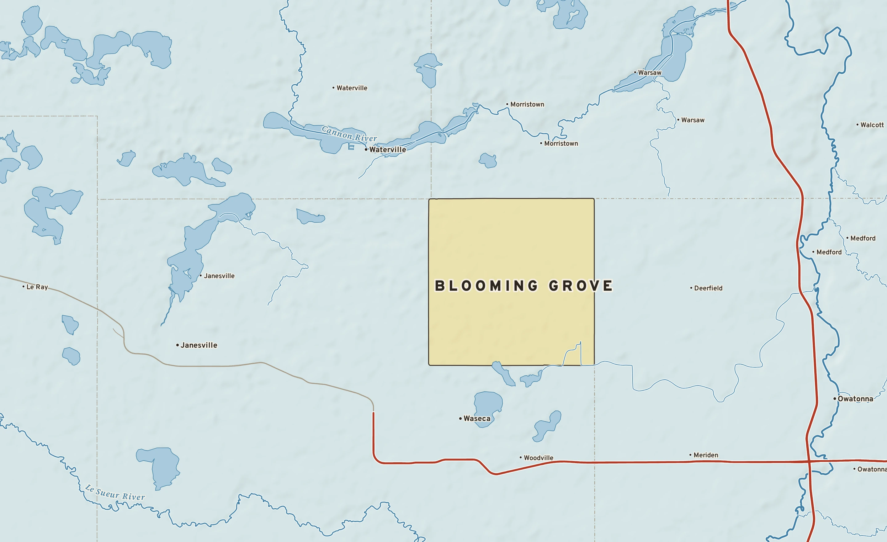 Shaded-relief atlas plate of Blooming Grove, Minnesota: rivers, roads, the city limits and where the water drains.