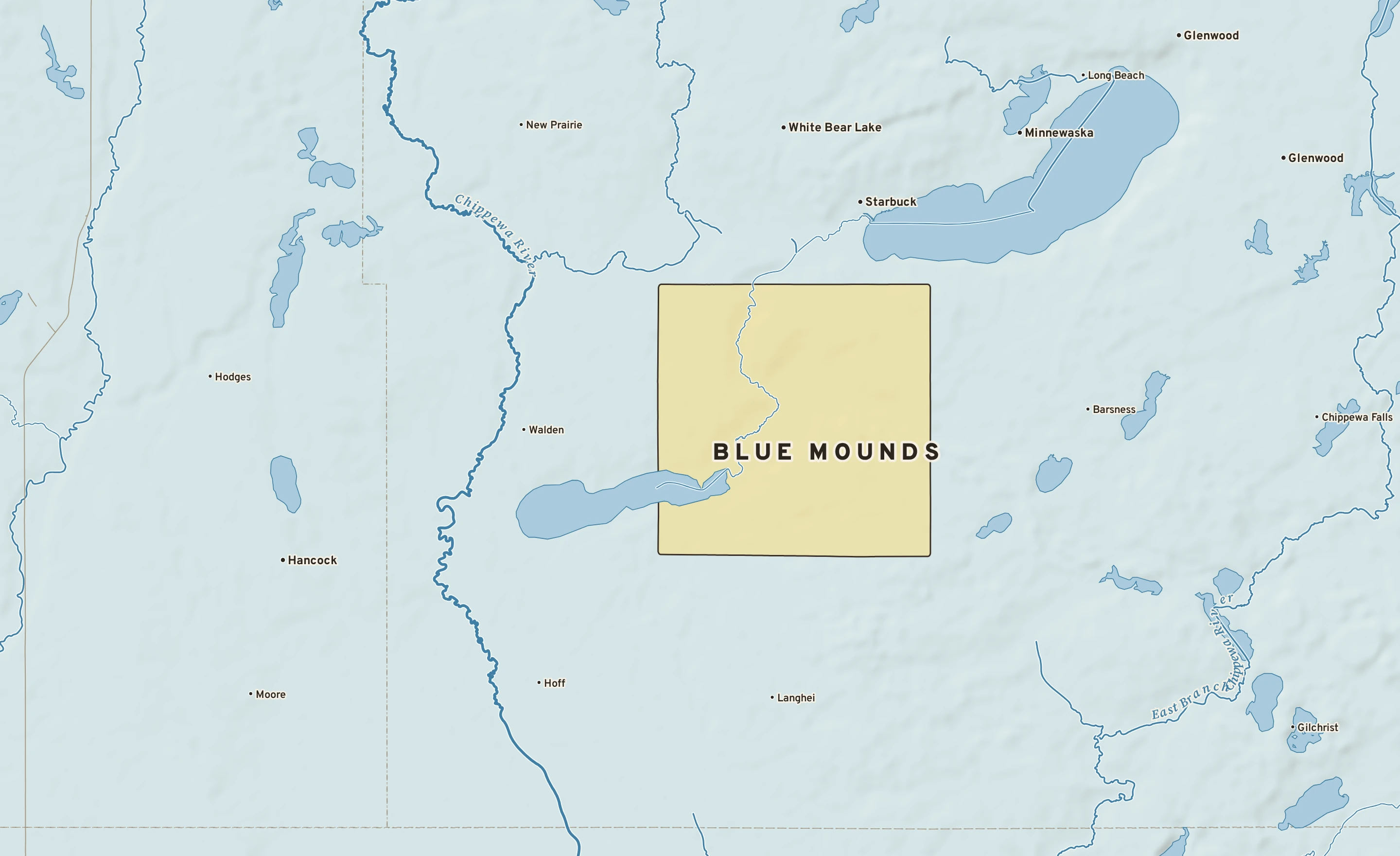Shaded-relief atlas plate of Blue Mounds, Minnesota: rivers, roads, the city limits and where the water drains.