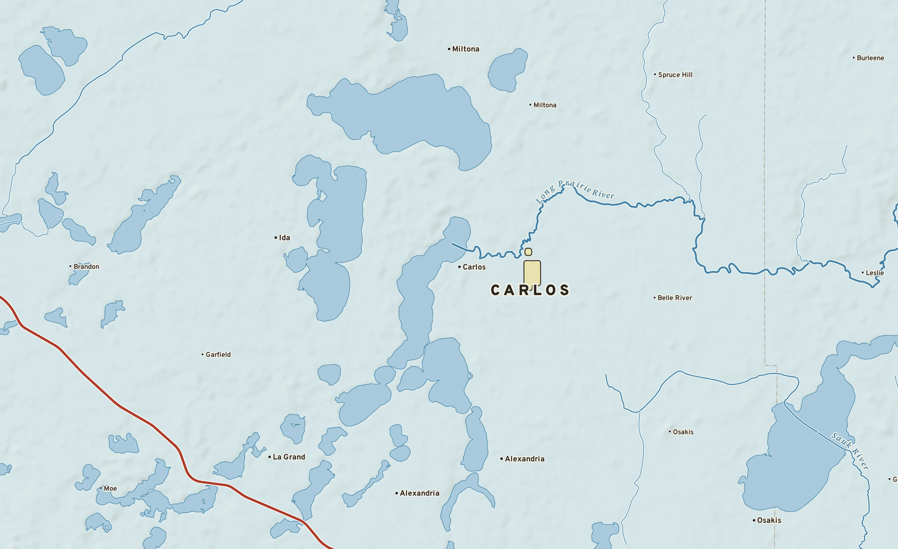 Shaded-relief atlas plate of Carlos, Minnesota: rivers, roads, the city limits and where the water drains.