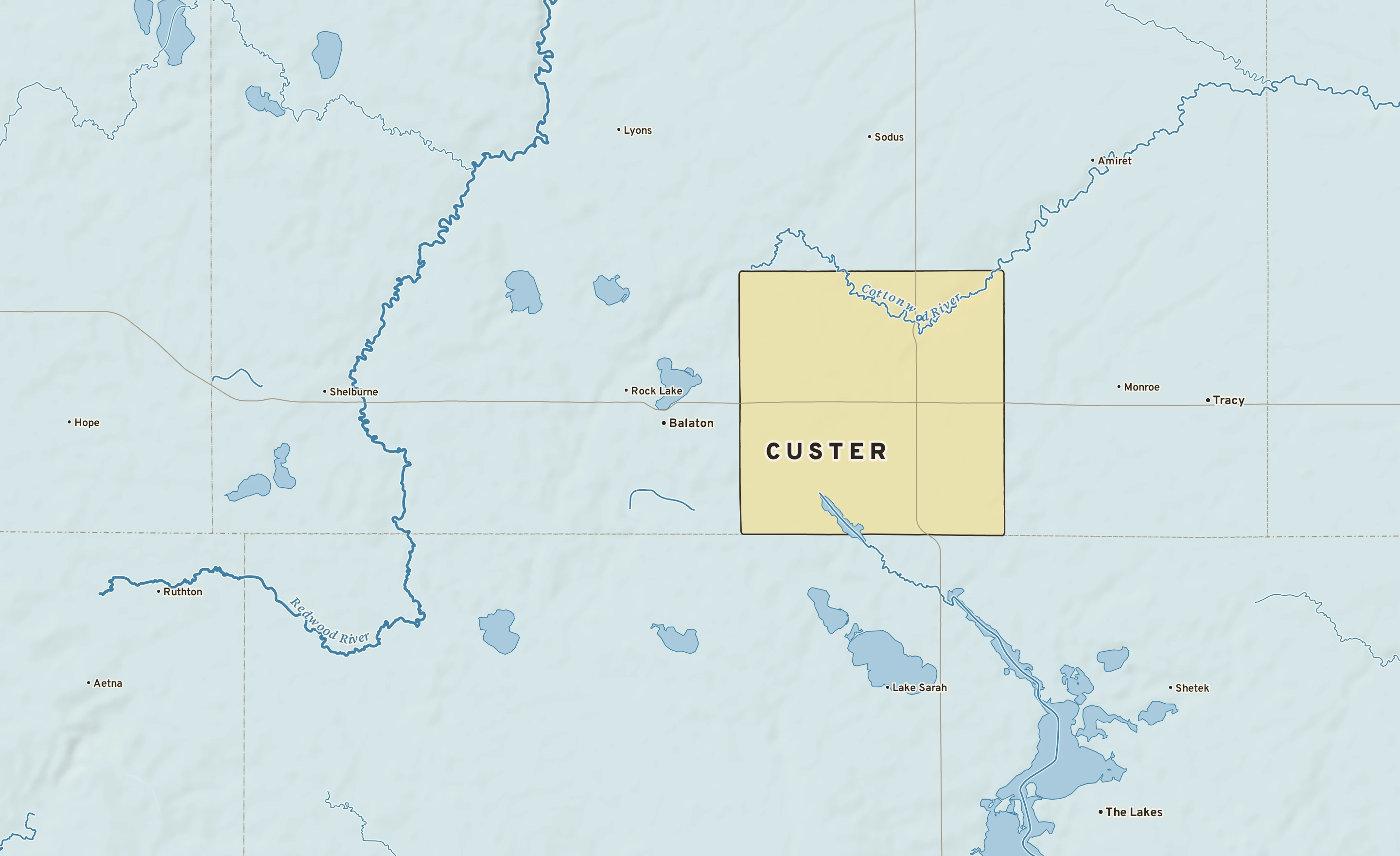 Shaded-relief atlas plate of Custer, Minnesota: rivers, roads, the city limits and where the water drains.